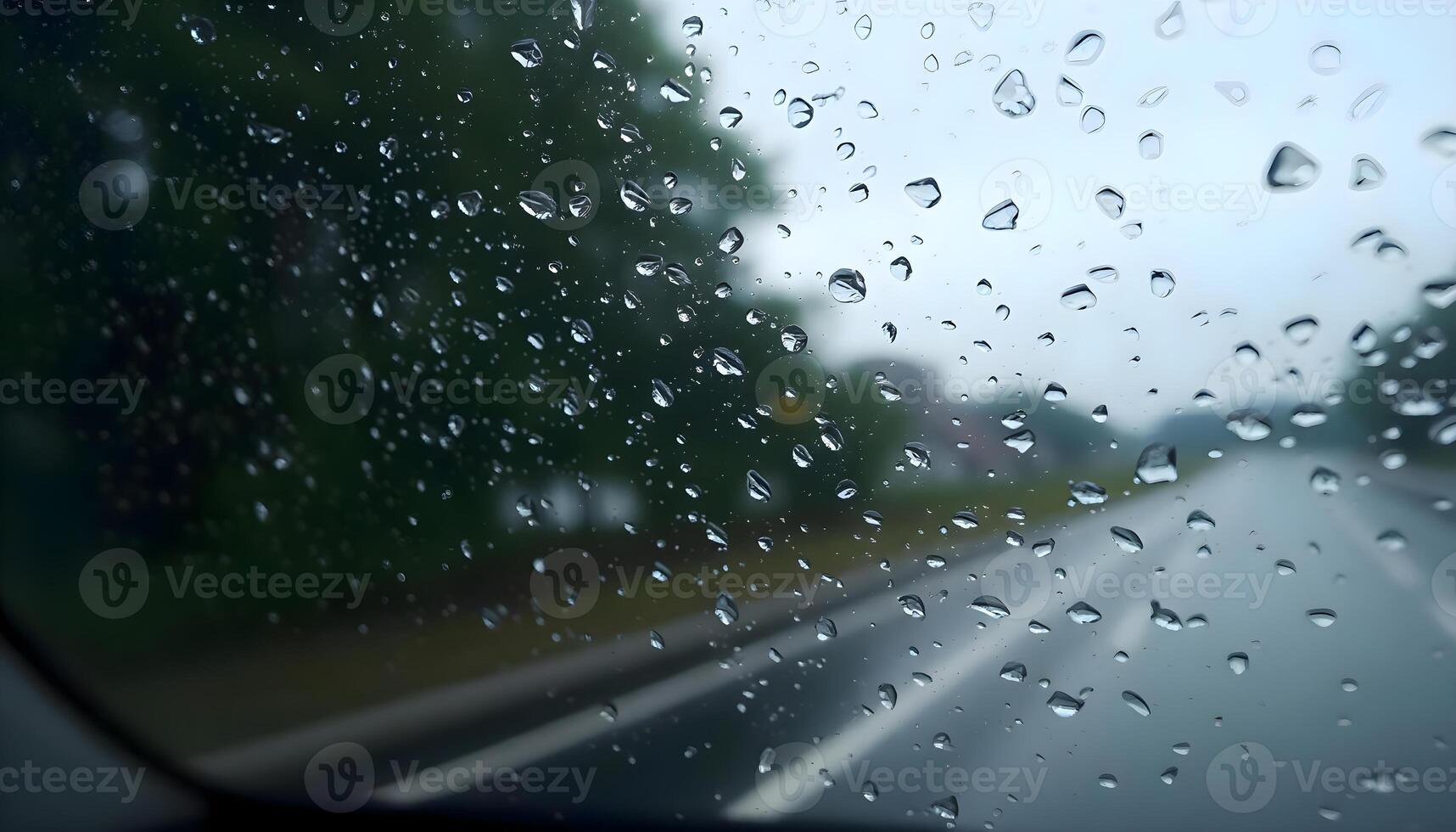 rain drops on the windshield of a car photo