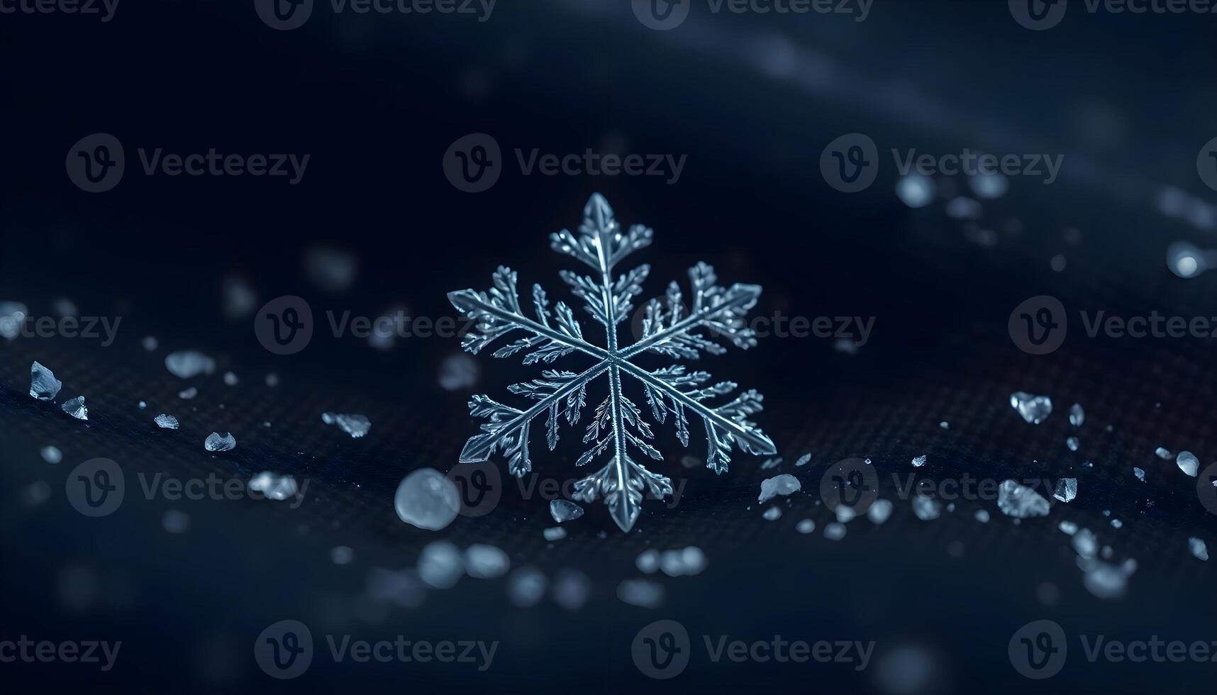 a snowflake is shown on a dark background photo