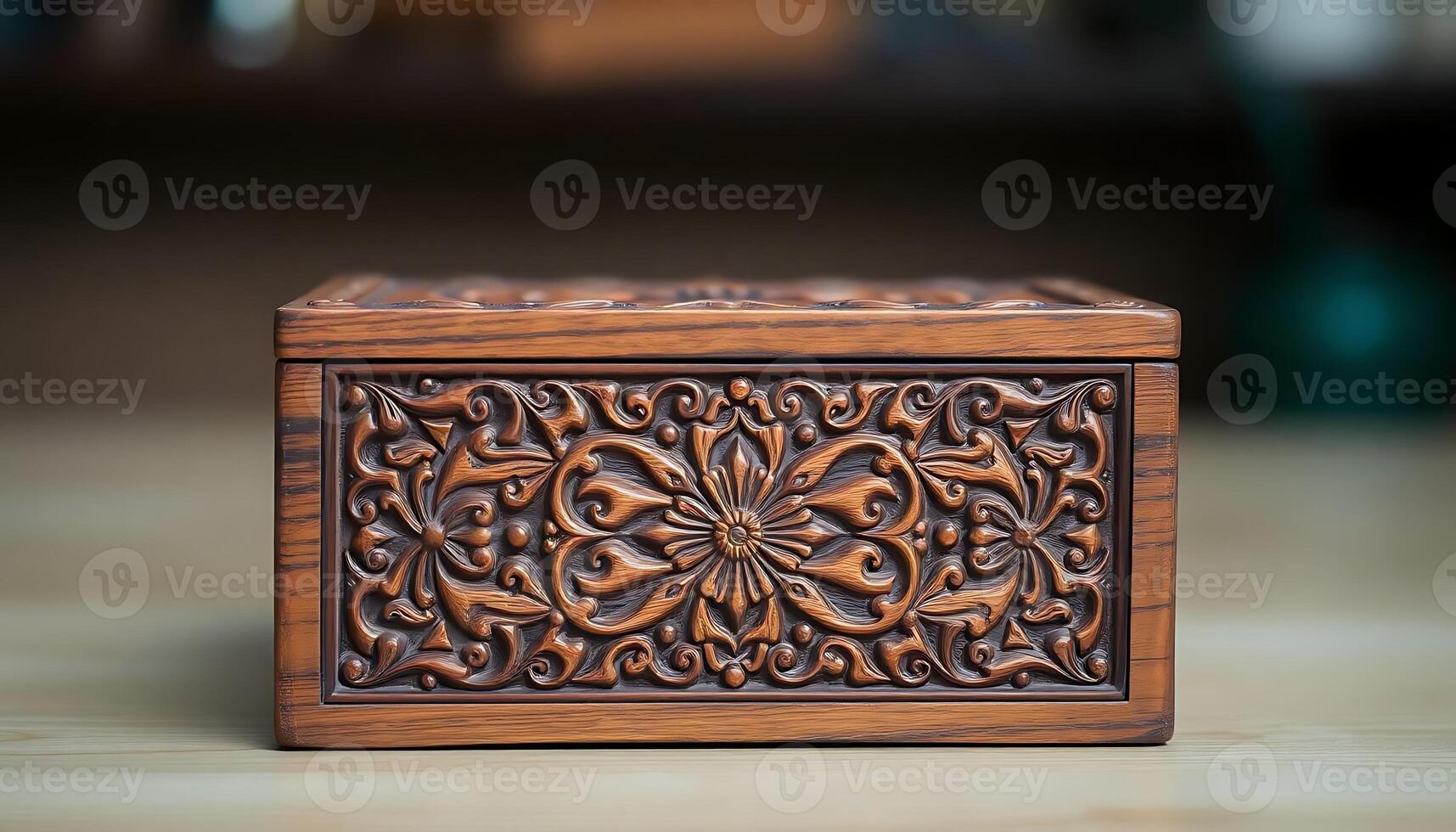 wooden box with a carved design on it photo