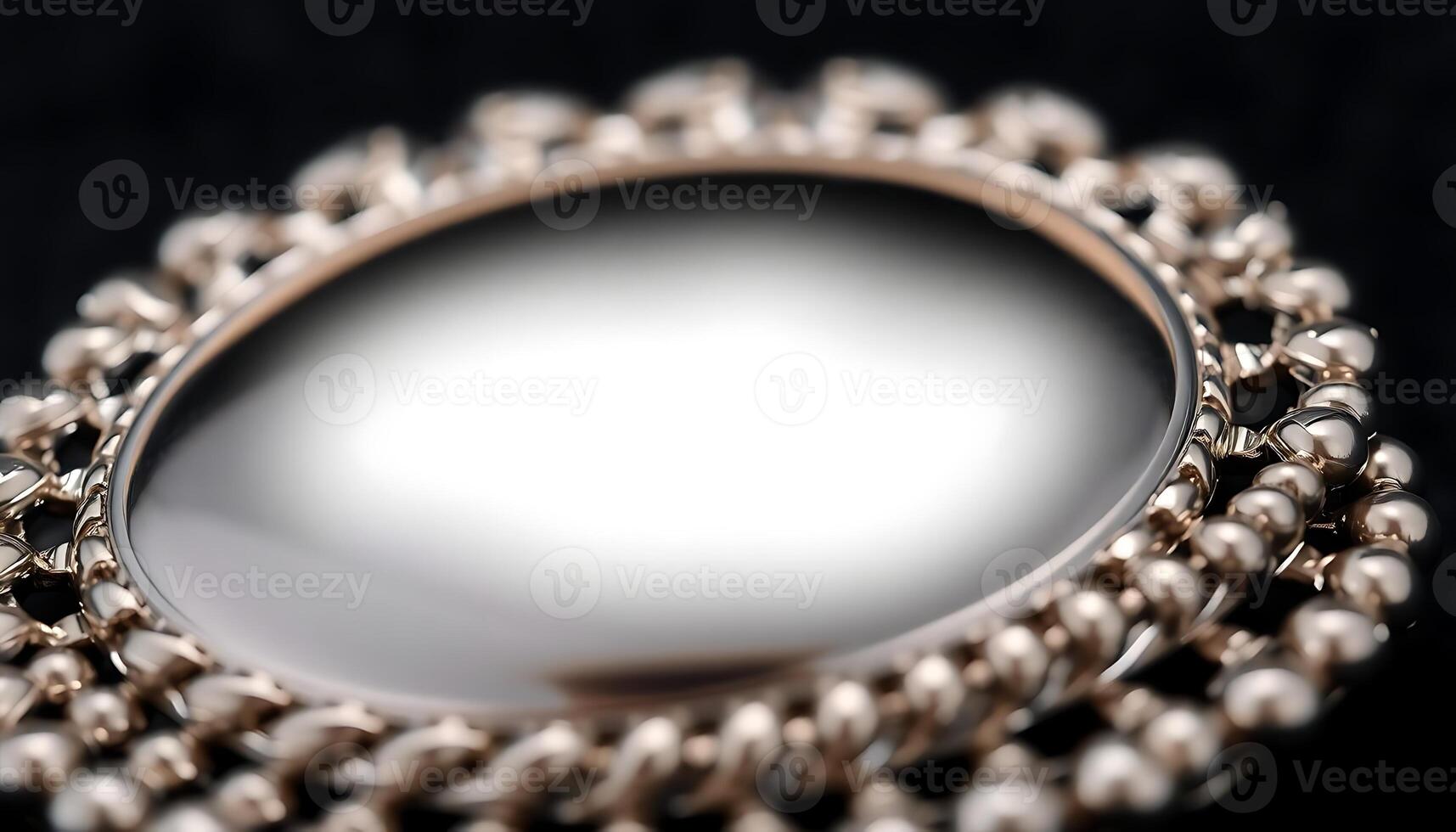 close up of a mirror on a black surface photo