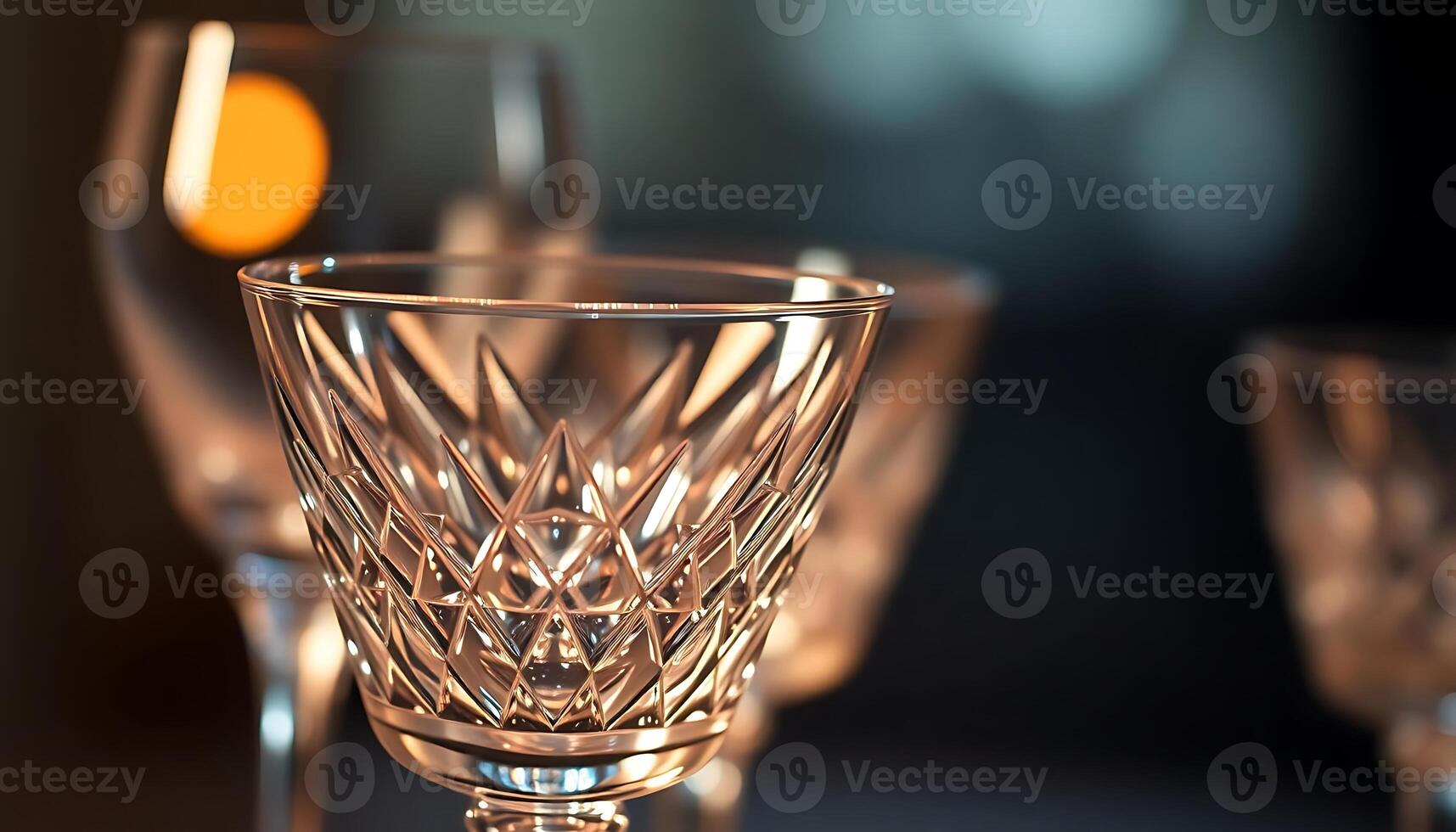 group of wine glasses sitting on top of a table photo