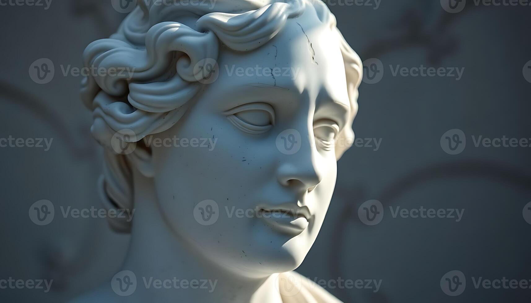 statue of a woman with her eyes closed photo