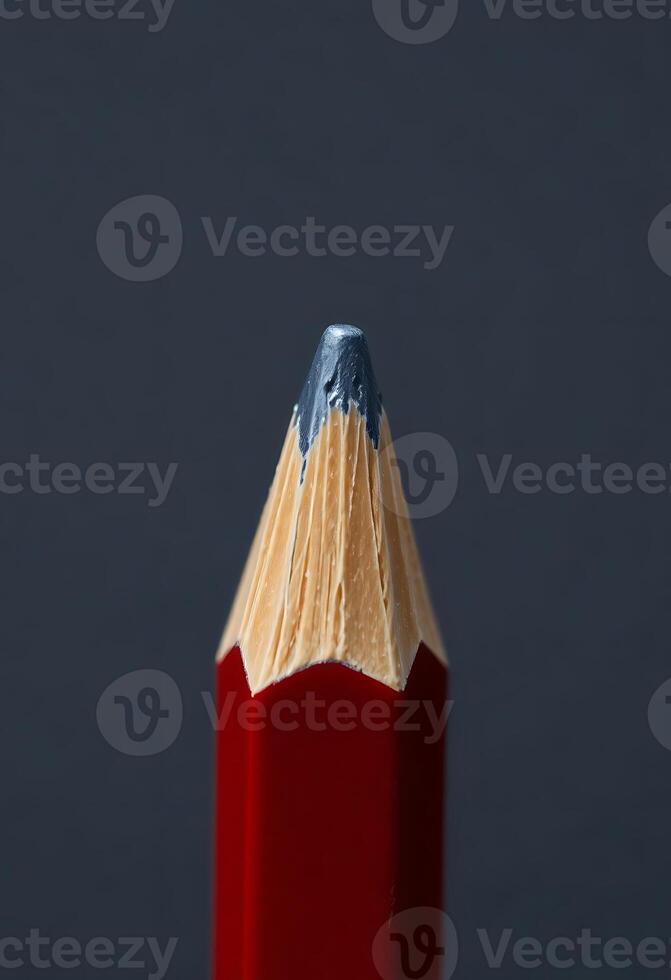 red pencil with a blue tip sticking out of it photo