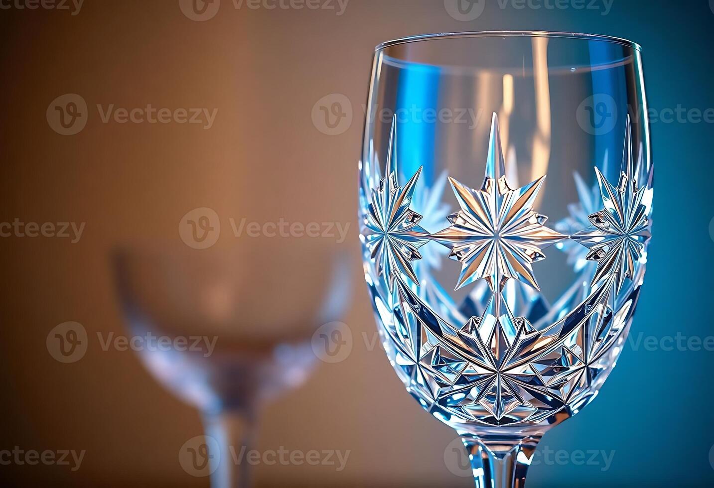 two wine glasses sitting next to each other on a table photo
