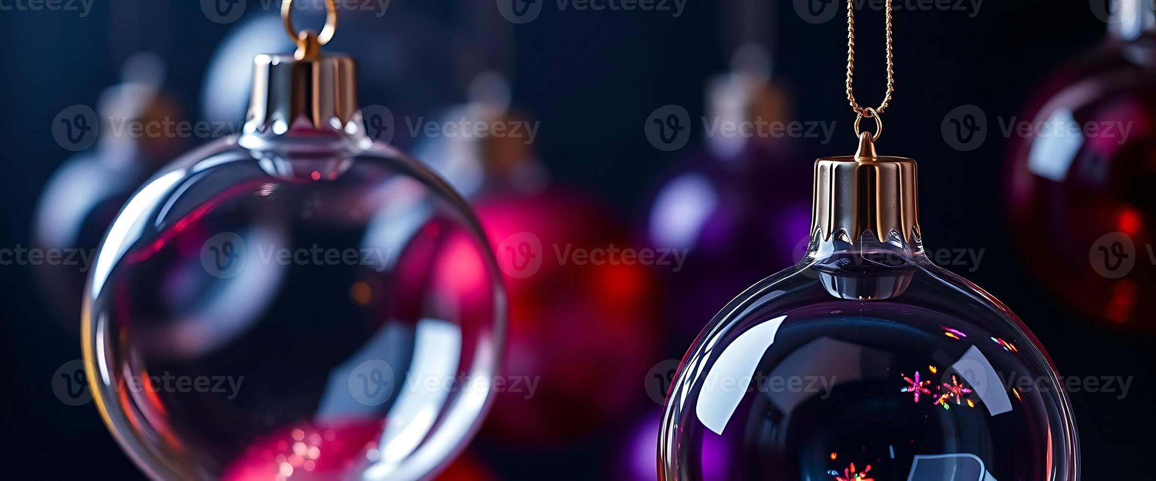 group of christmas ornaments hanging from strings photo