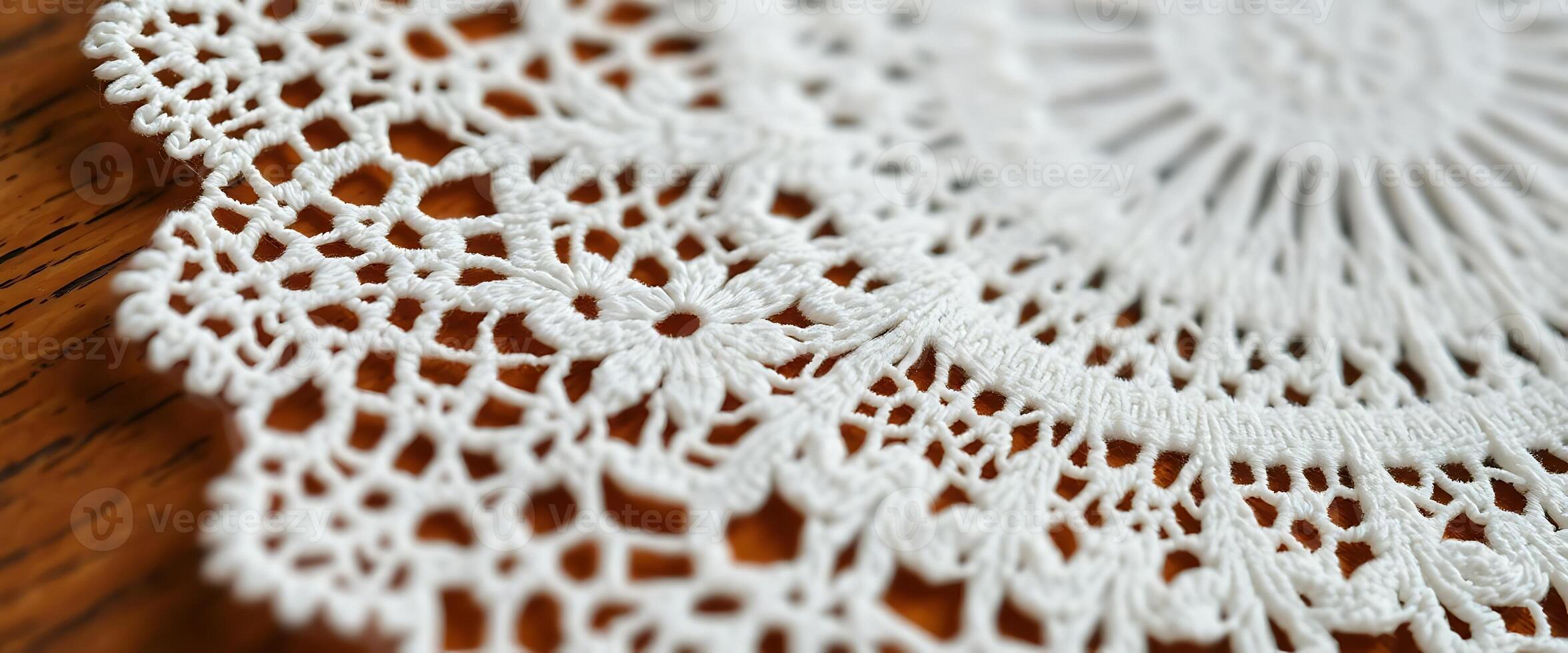 close up of a doily on a wooden table photo