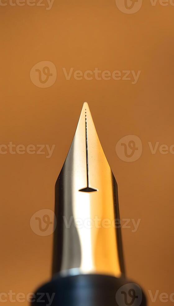 close up of a fountain pen with a brown background photo