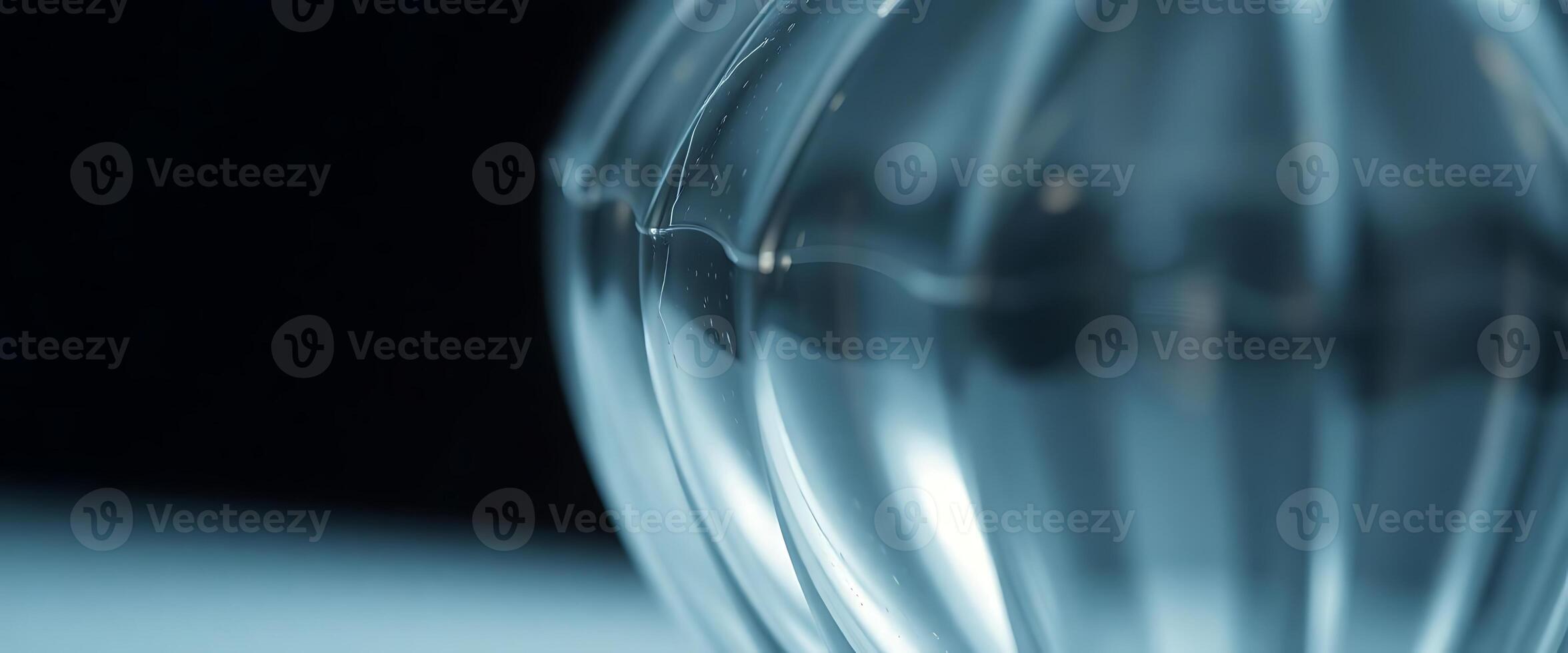 close up of a glass vase with a black background photo