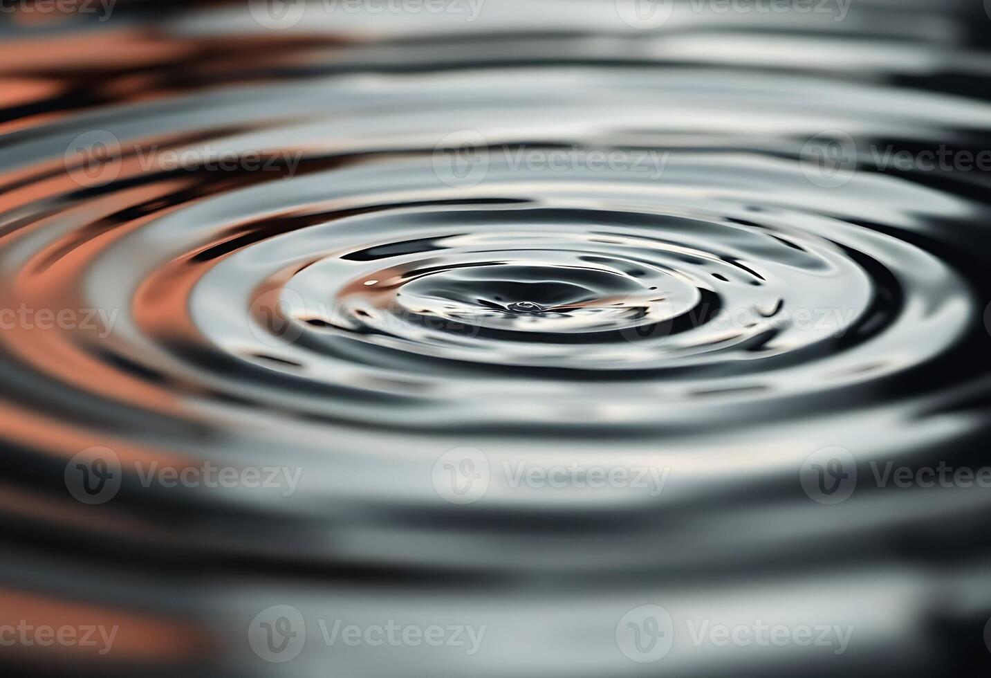 close up of a water drop with a black background photo