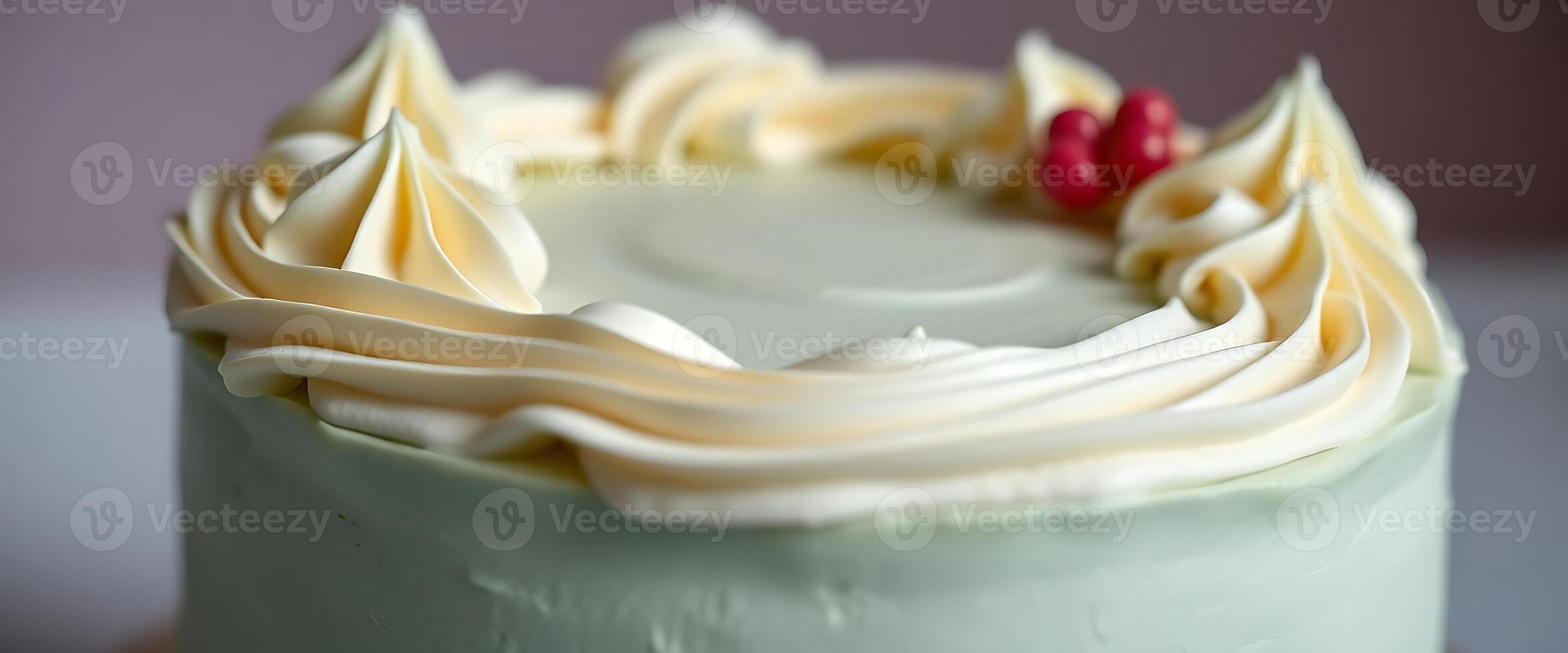 close up of a cake with white frosting photo