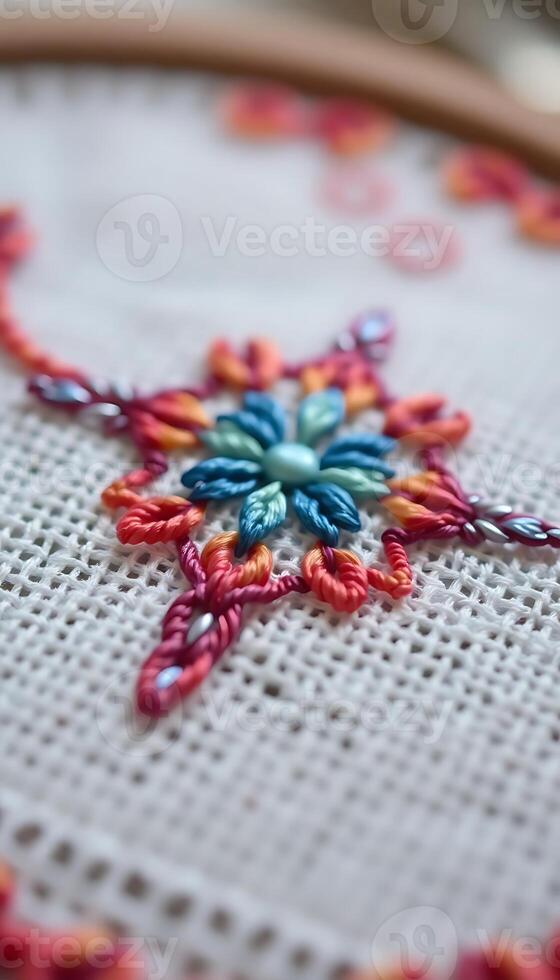 close up of a cross stitch pattern on a piece of cloth photo