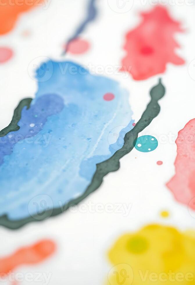 close up of a piece of paper with paint splattered on it photo