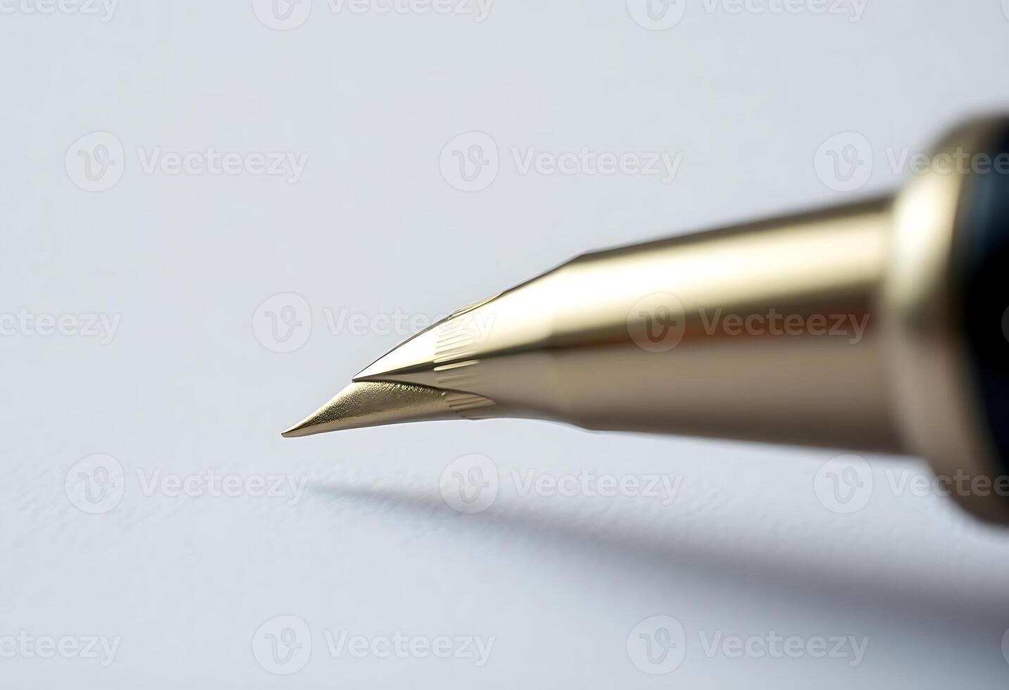 close up of a fountain pen on a white surface photo