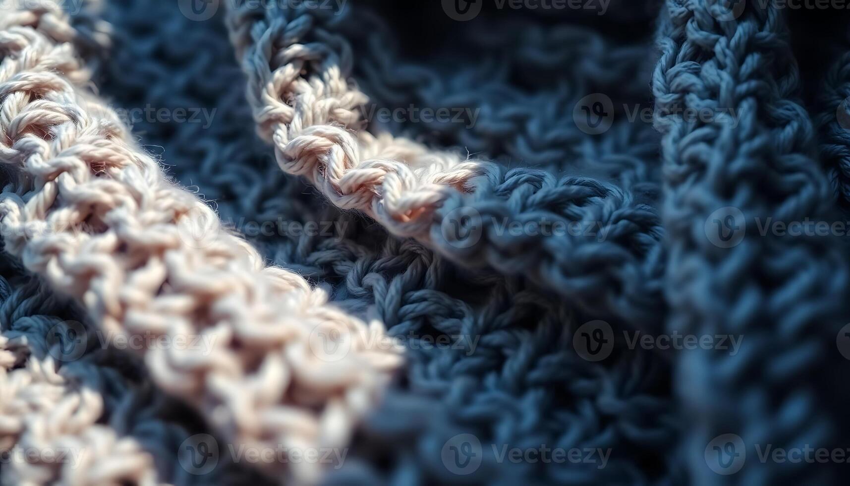 close up of a blue and white knitted blanket photo