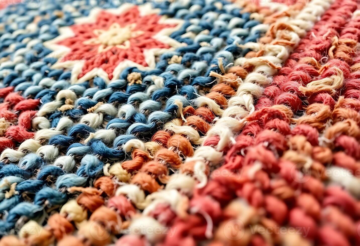 close up of a crocheted blanket with a star on it photo