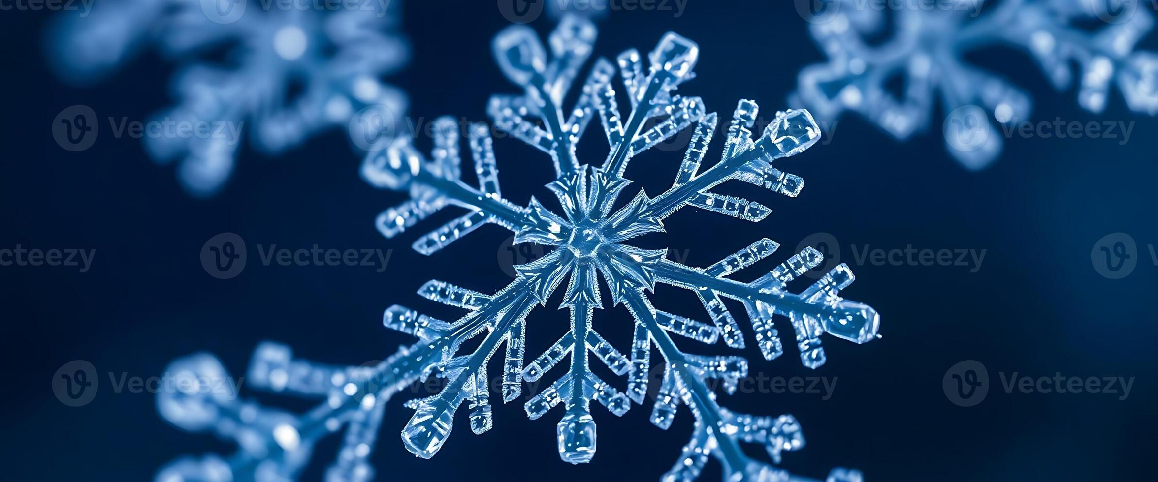 close up of a snowflake on a blue background photo