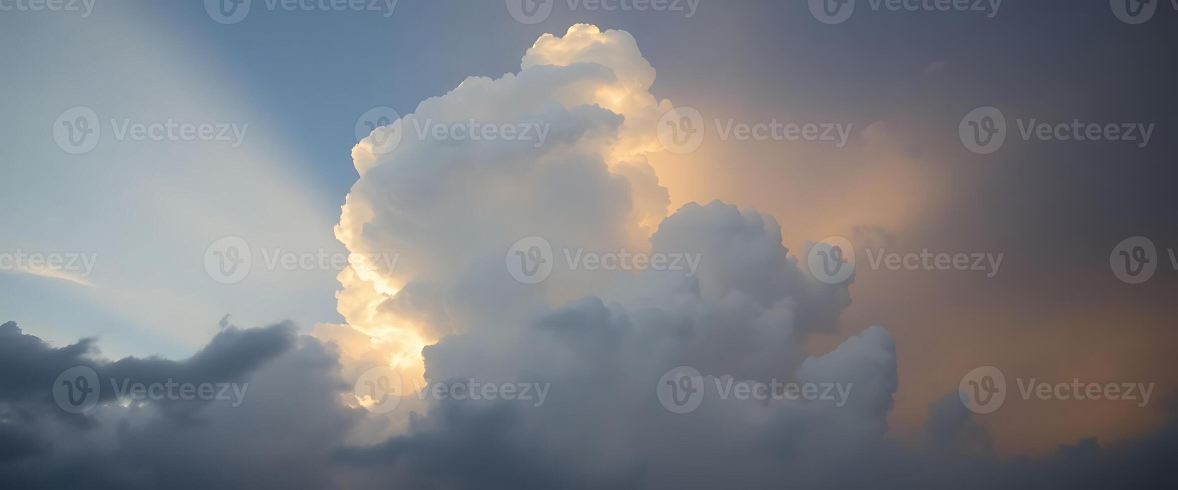 large cloud in the sky with sunbeams photo