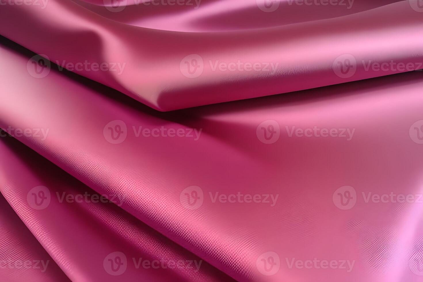 The pink satin fabric showcases a beautifully draped texture that exudes elegance. Its soft sheen and graceful flow create a captivating visual appeal. photo
