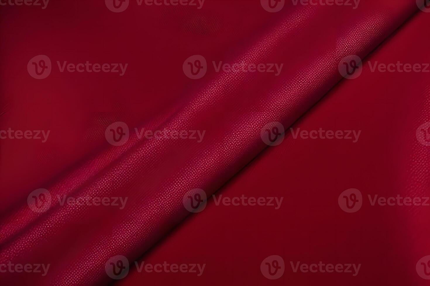 Crimson fabric texture serves as a captivating backdrop, characterized by a rich deep red drape. photo