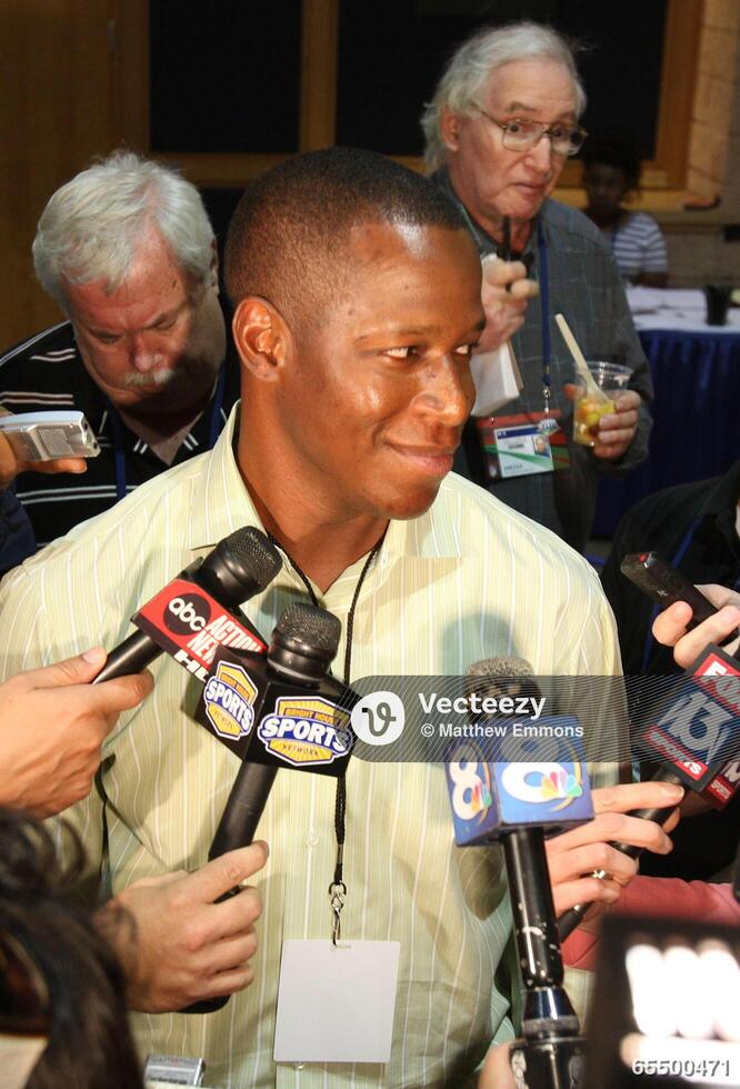 Tampa Bay head coach Raheem Morris answers questions during an impromptu  interview in the Super Bowl XLIII Media Center at Tampa Convention center.  65500471 Editorial Image