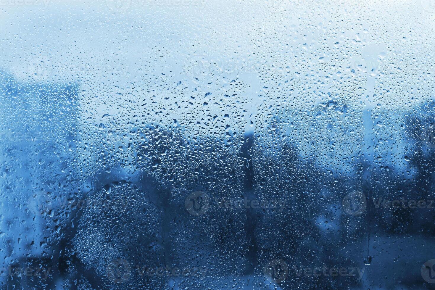 Water drops on window glass photo