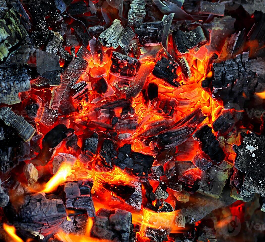 Bright live coals natural background photo