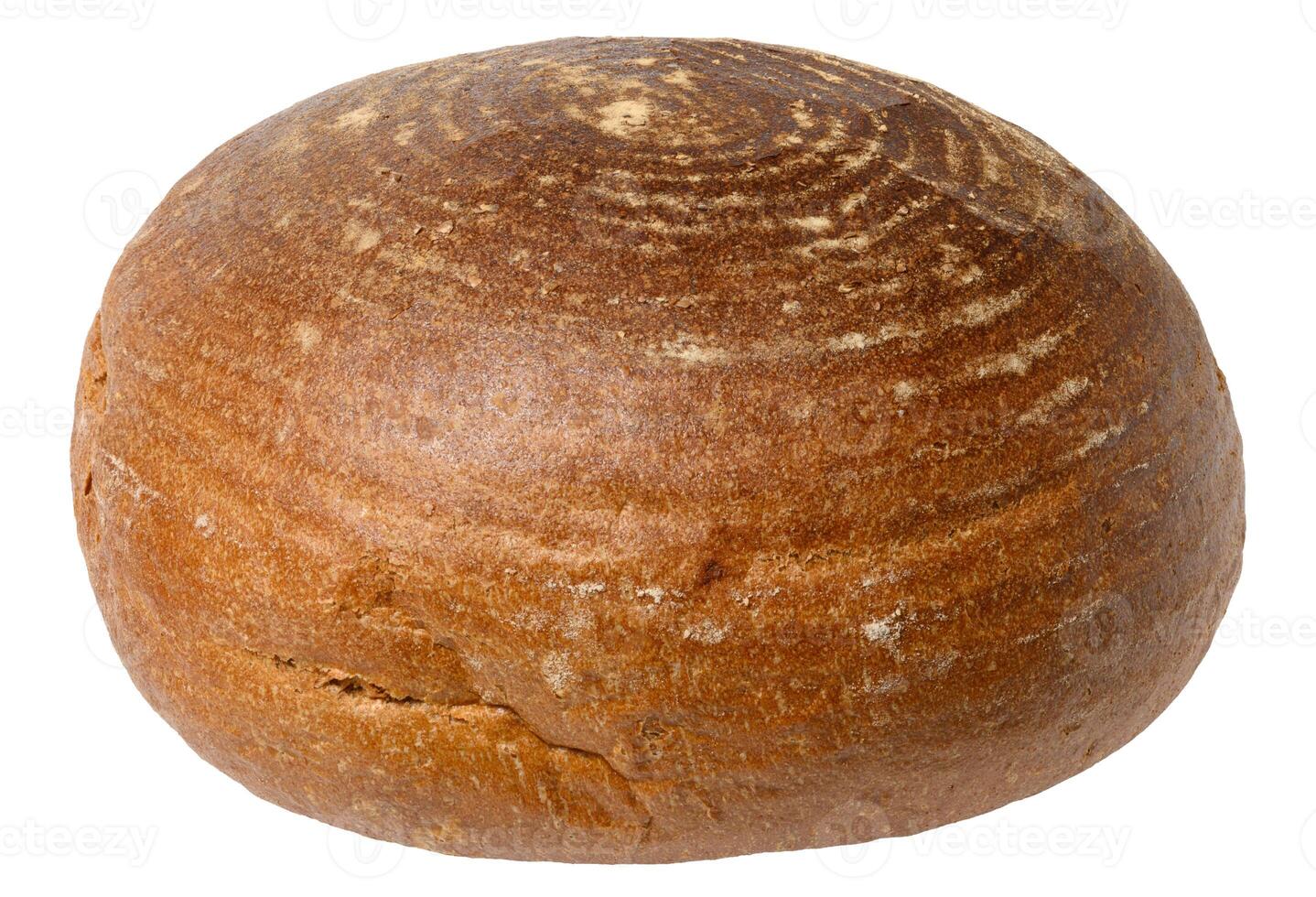 Round loaf of rye bread with a distinctive pattern on the crust. Isolated background photo