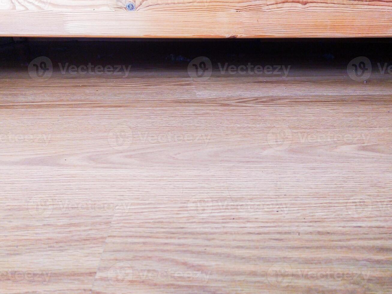 Abstract wood grain floor with dark shadow a sense of depth, mystery, and potential hidden issues. Use for construction, renovation, or conceptual design projects. photo