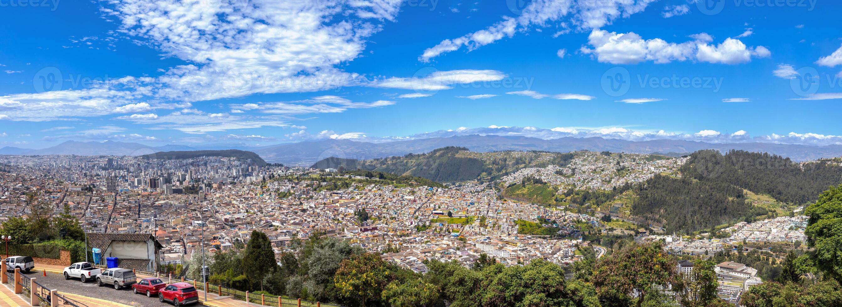 Skyline panoramic view of historic center in Quito, Ecuador from lookout of Virgin of Panecillo photo