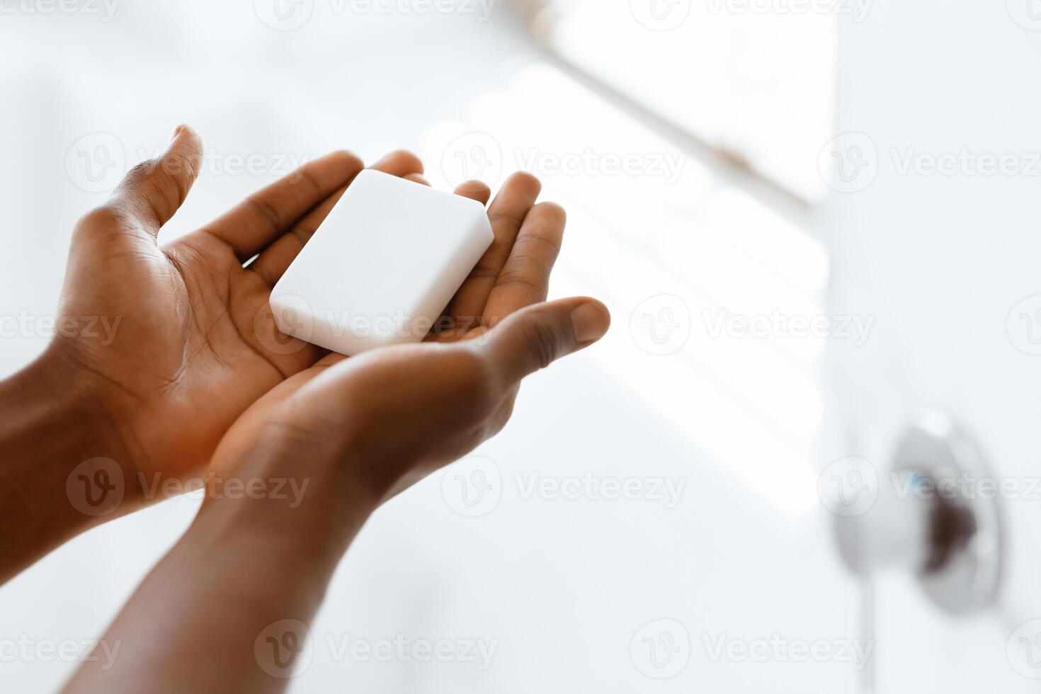 Handwashing Hygiene. Unrecognizable Black Man Washing Hands Holding Antibacterial Soap Standing In Bathroom Indoors. Hands-Washing, Healthcare And Virus Protection. Cropped, Closeup photo