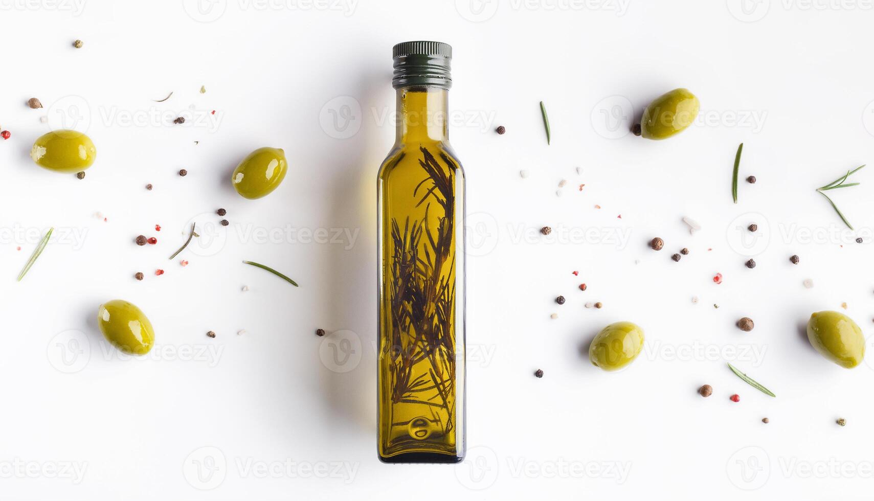 Olive oil with herbs in bottle, scattered olives and rosemary on white background, top view. Food background concept photo