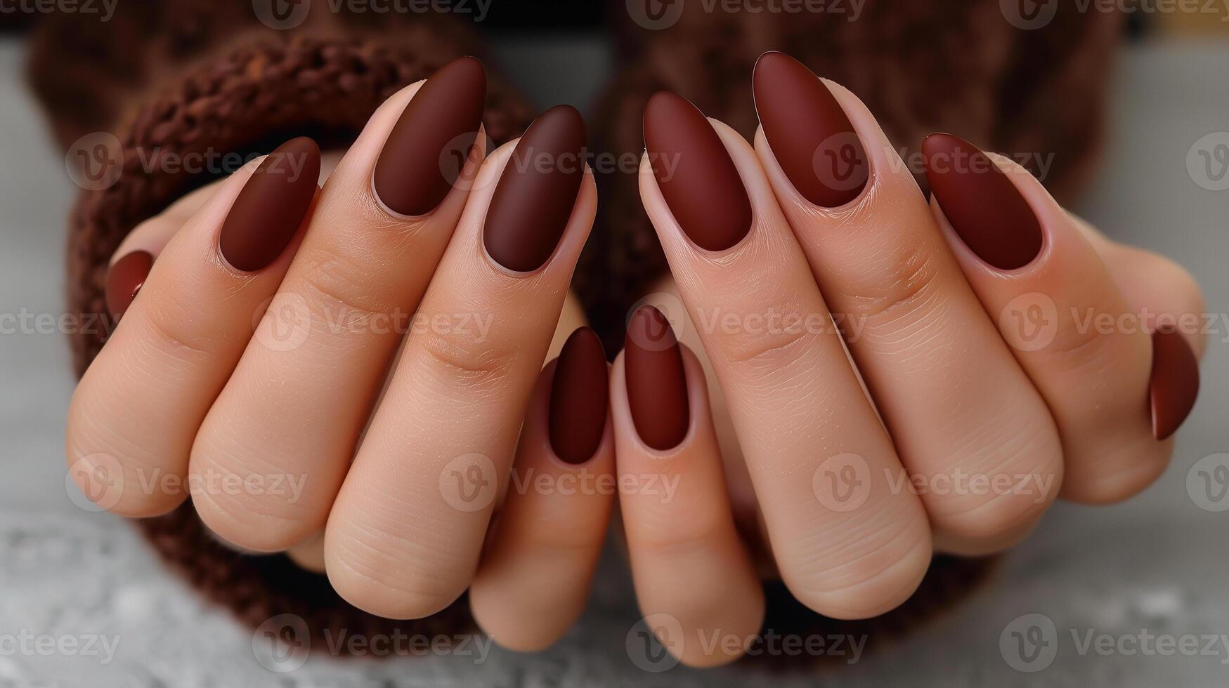 This Beautiful deep burgundy nails with a matte finish showcase expert craftsmanship. photo