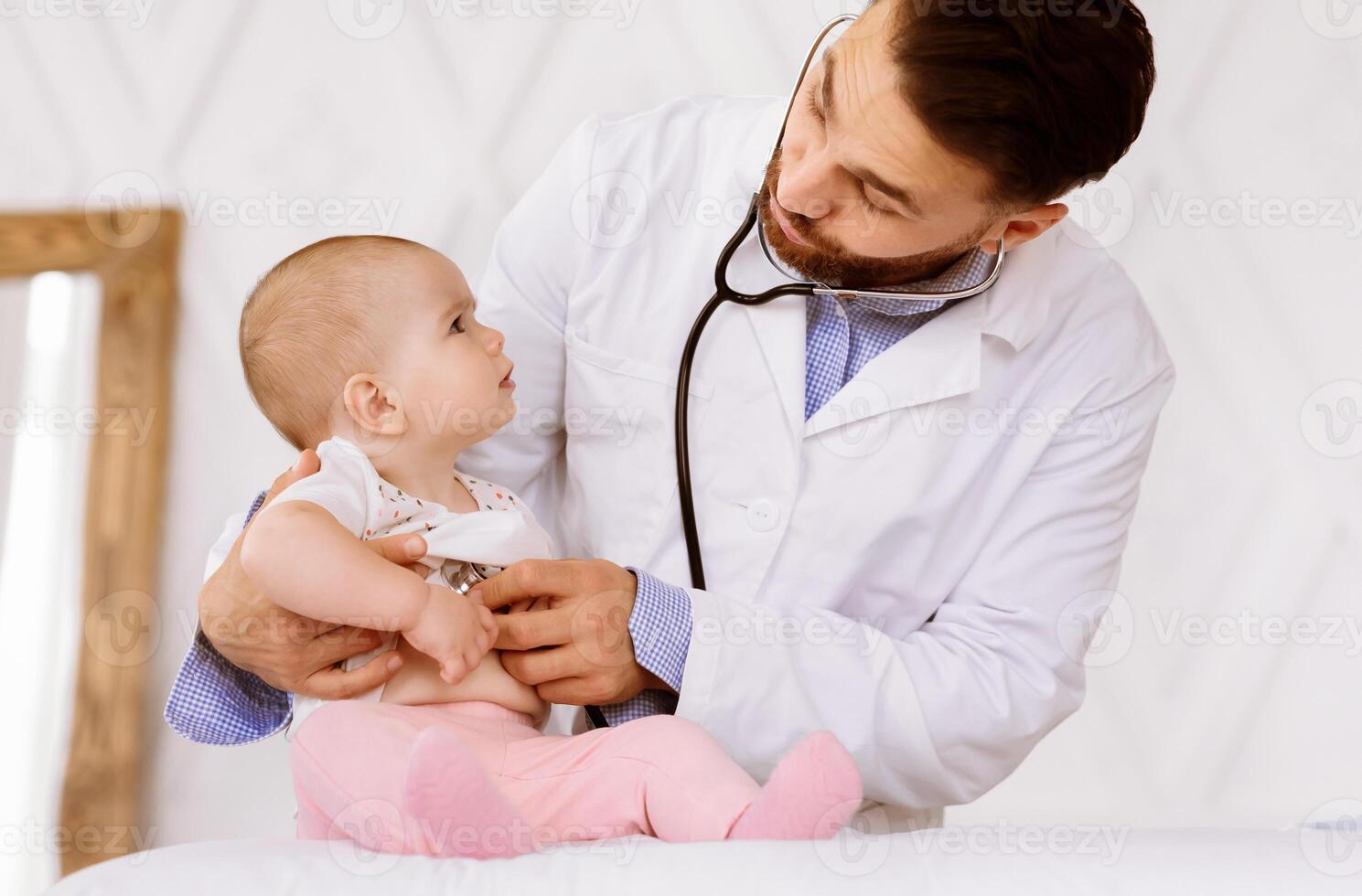 Medical Checkup. Doctor Examining Baby Toddler With Stethoscope Listening To Her Heartbeat During Appointment Checking Heart In Hospital. Sick Little Patient In Clinic, Child Healthcare Concept photo