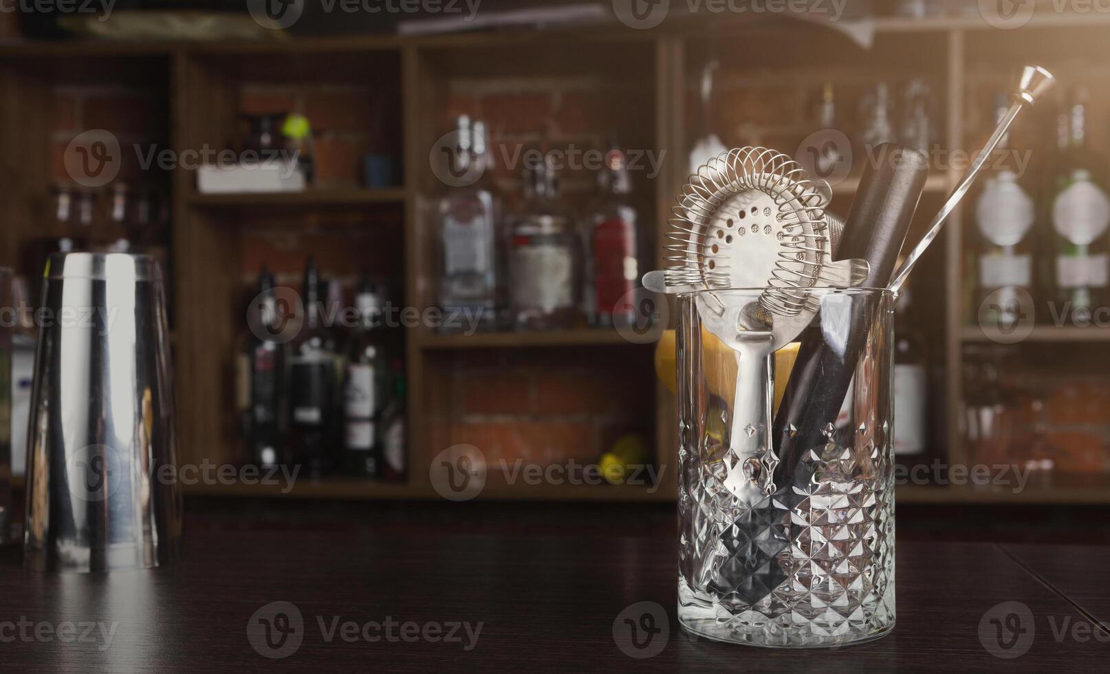 Bartender tools. Set of accessories for making cocktails on bar counter, copy space photo
