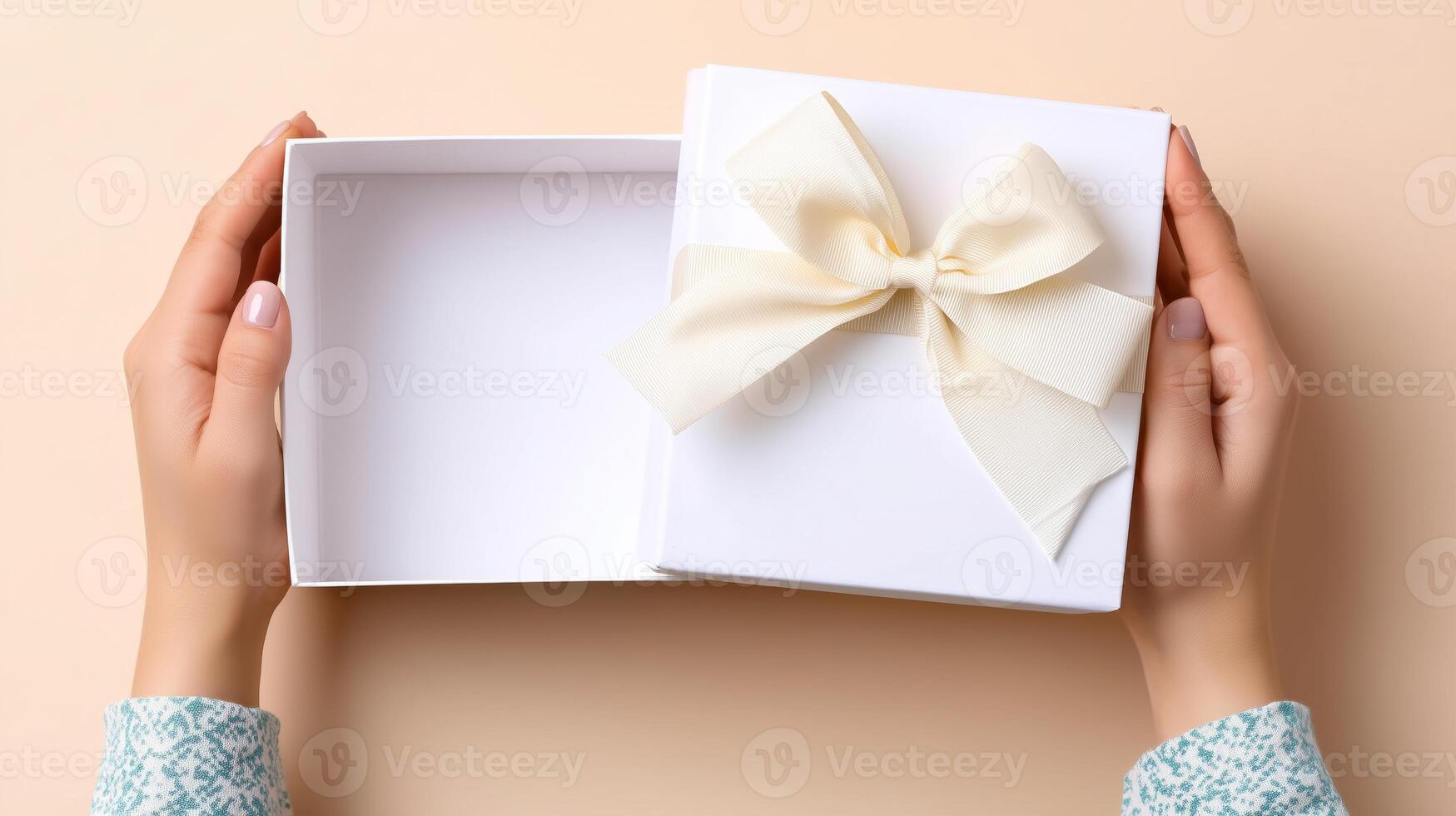 Hands gently open a white delivery box adorned with a soft bow. The background is simple, highlighting the box's elegant design and the anticipation of its contents. photo
