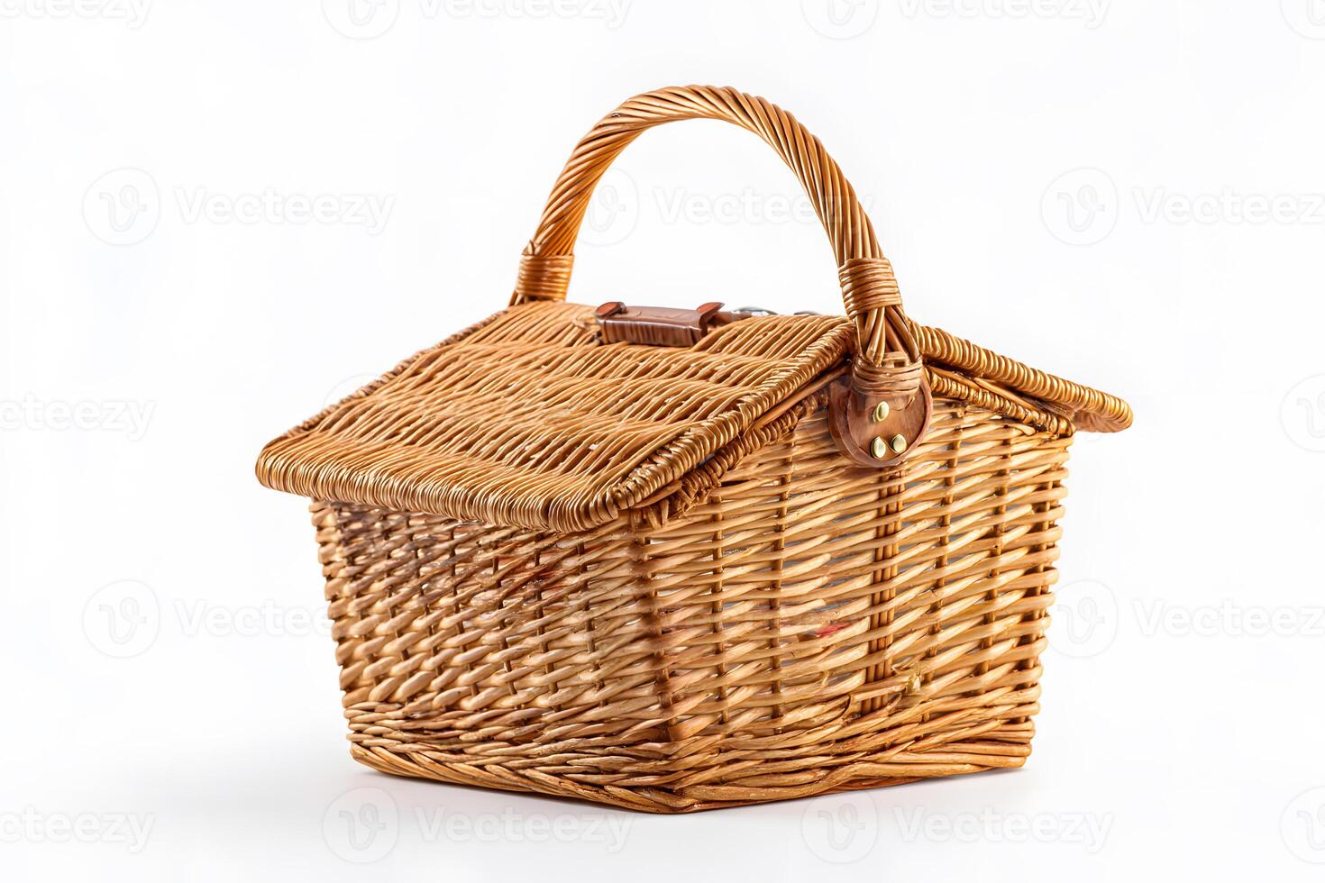 Traditional picnic basket on a white background featuring assorted snacks and drinks for outdoor adventures. photo