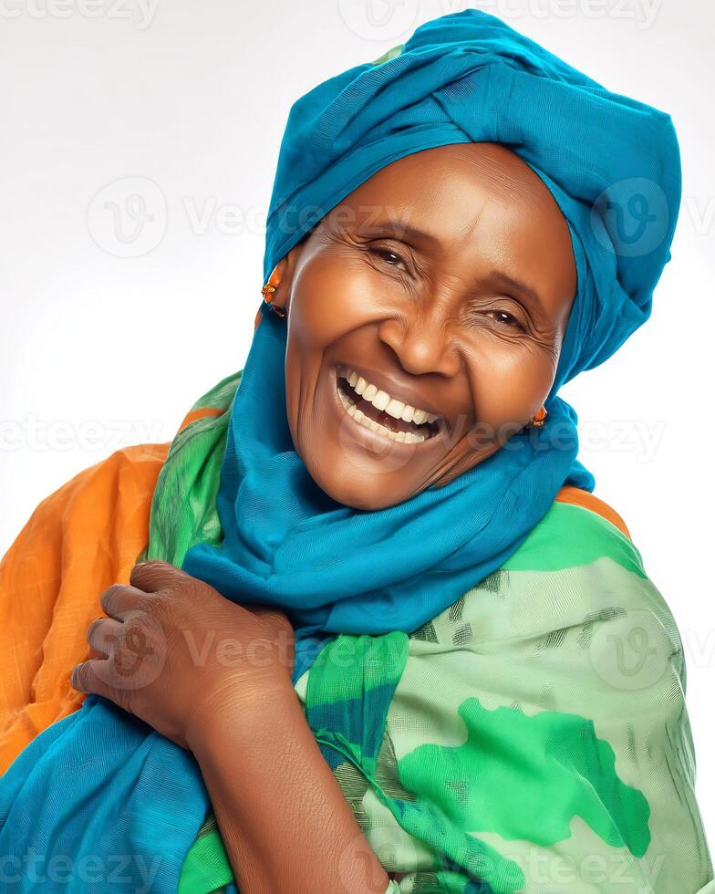 An older woman with a blue scarf and green scarf photo