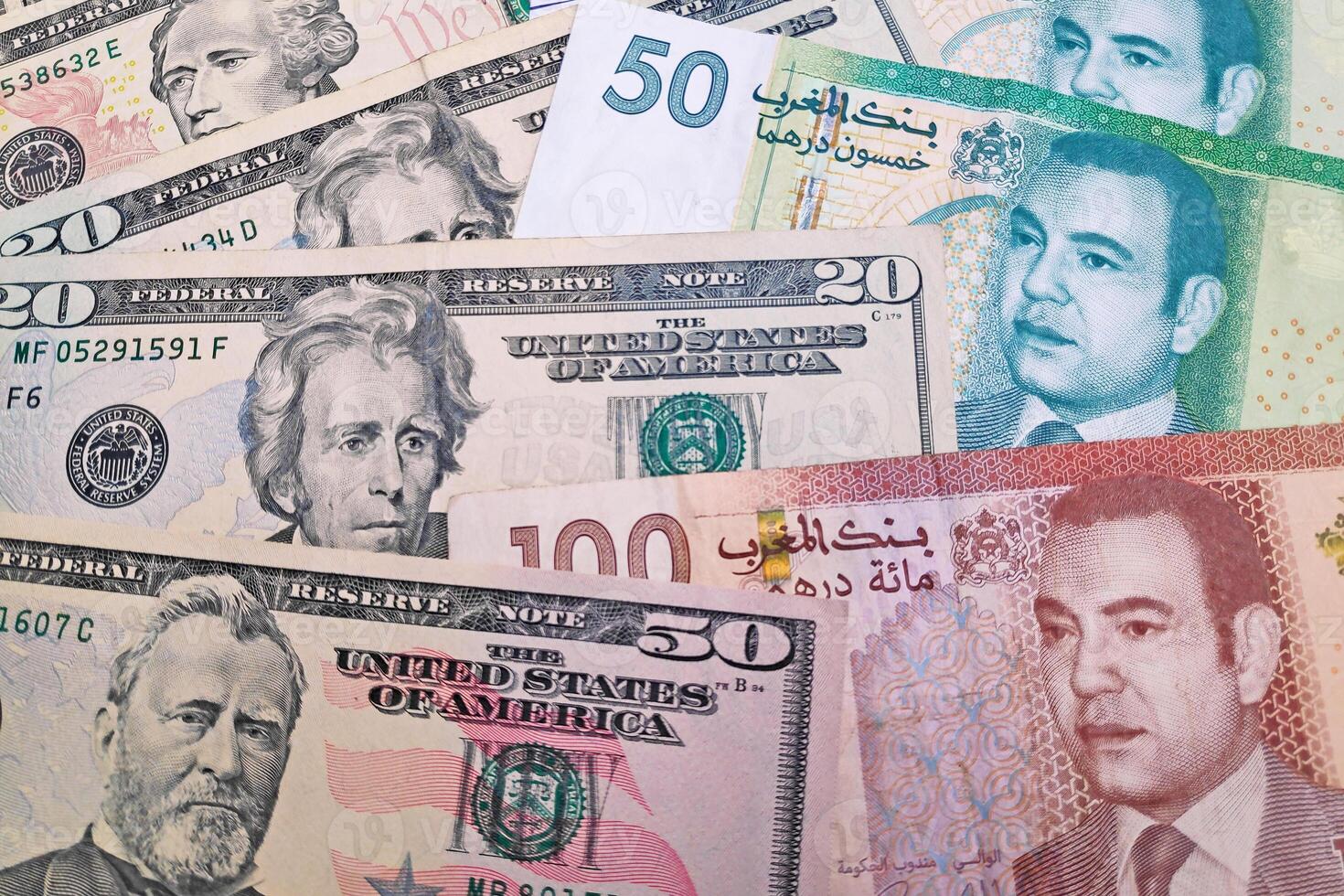 Stack of US Dollar and Moroccan dirham photo