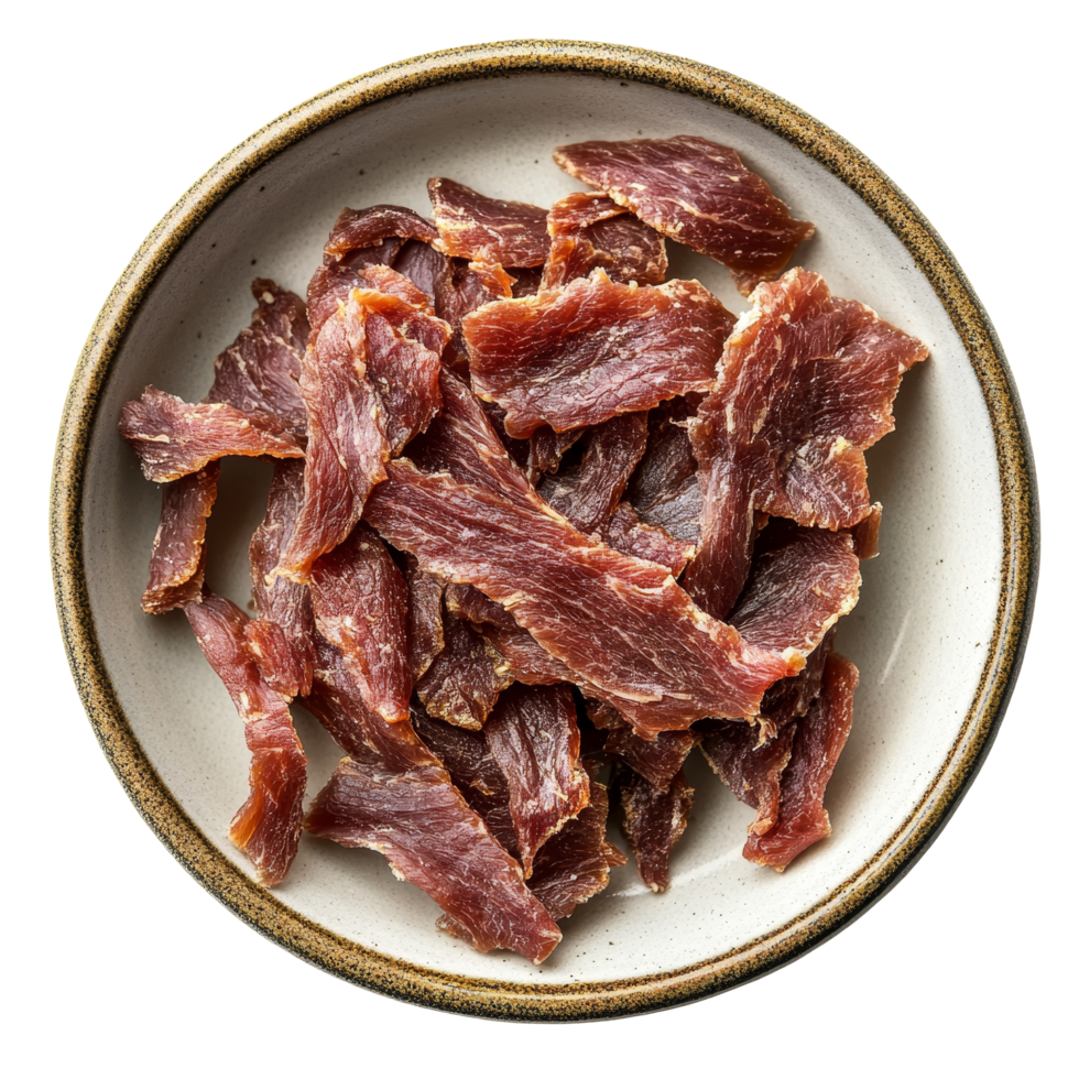 Dried meat strips neatly arranged on a plate viewed from above against a clean background, dried meat strips on plate shot from above isolated on transparent background png