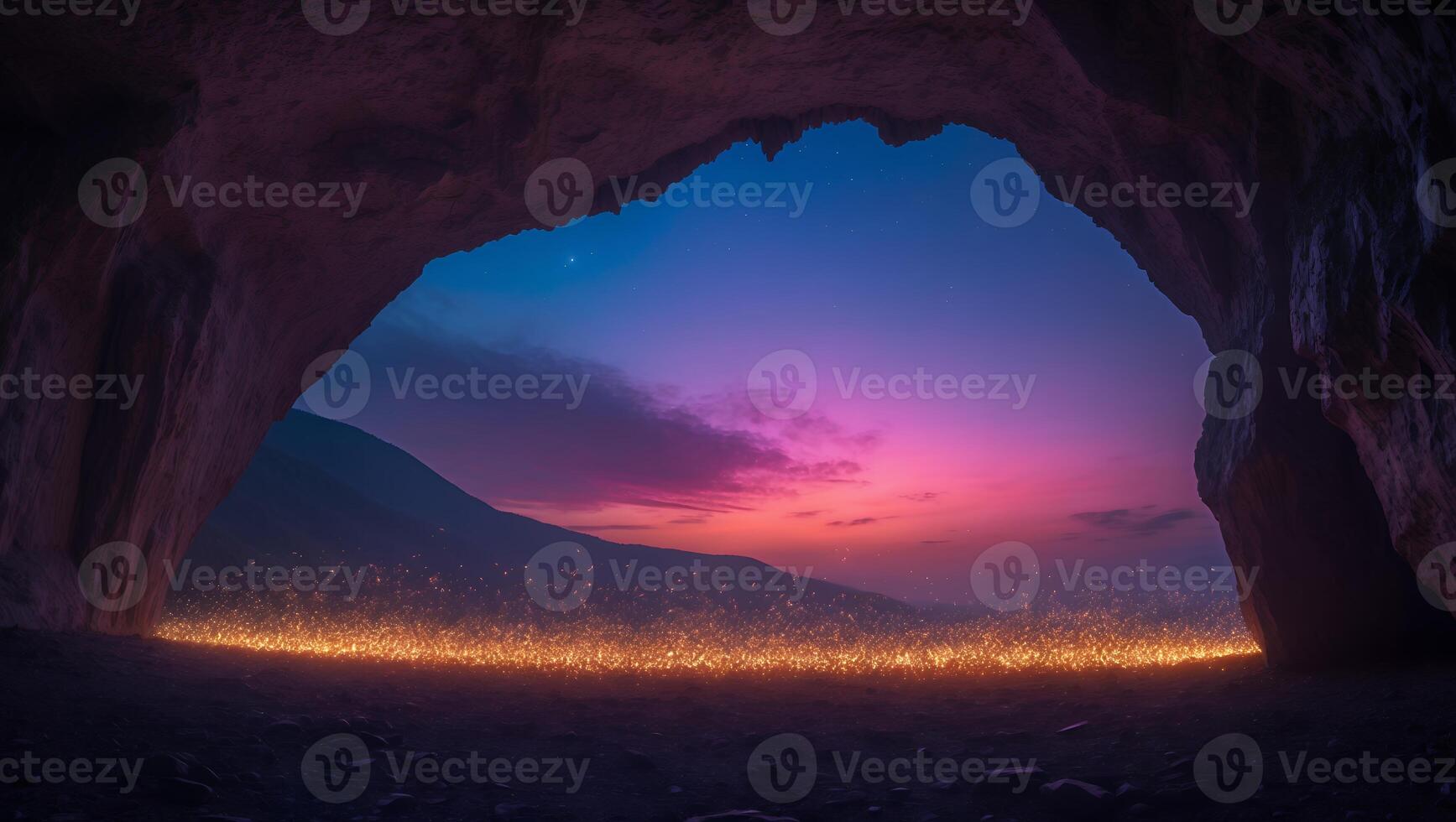 Cave Entrance at Dusk with Glowing Lights photo