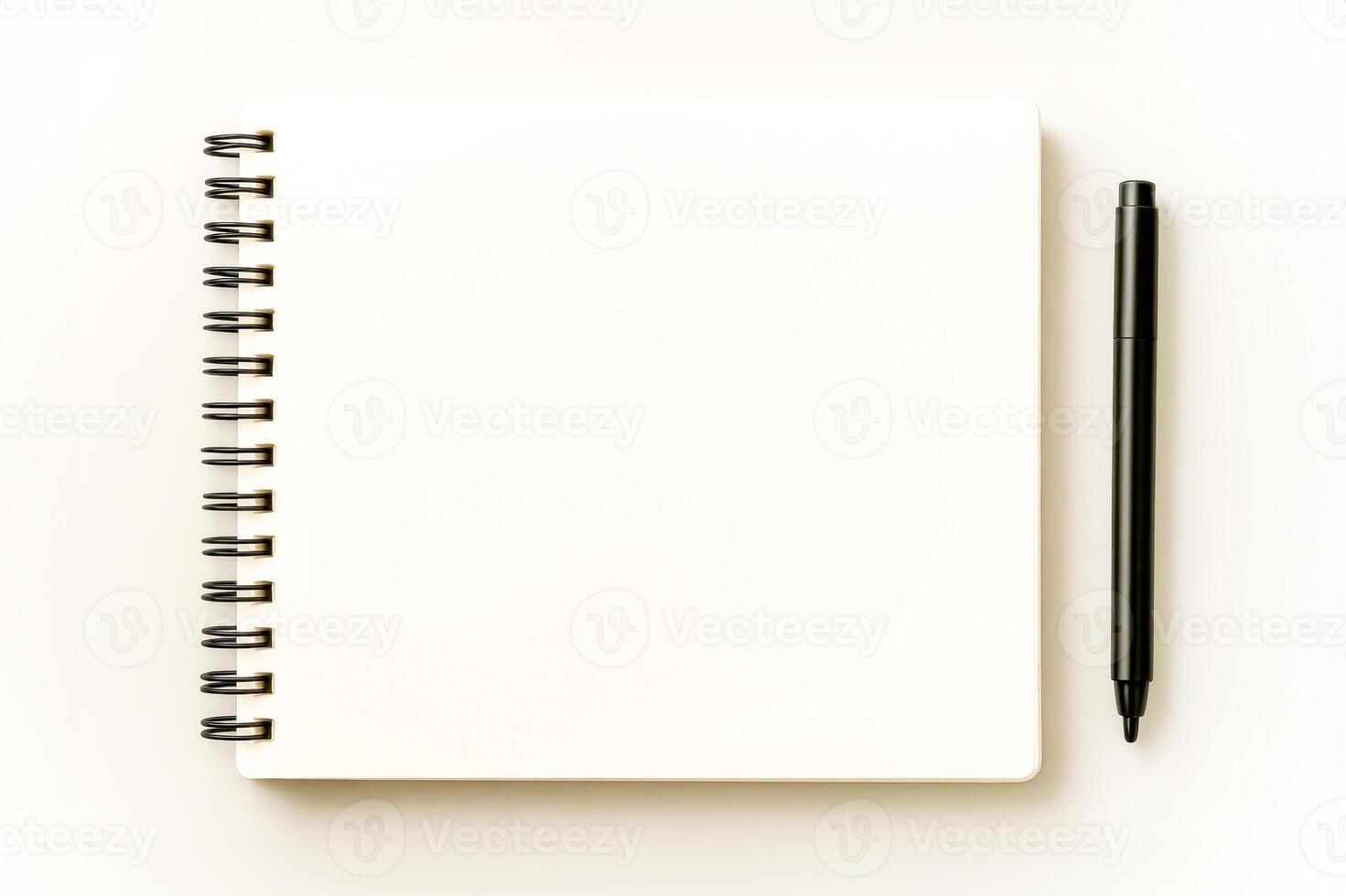 Blank Spiral Notebook With Pen On Minimal Background For Design Mockups, Note-Taking Visuals, Creative Planning Templates, And Branding Presentations In Modern Workspace Style photo