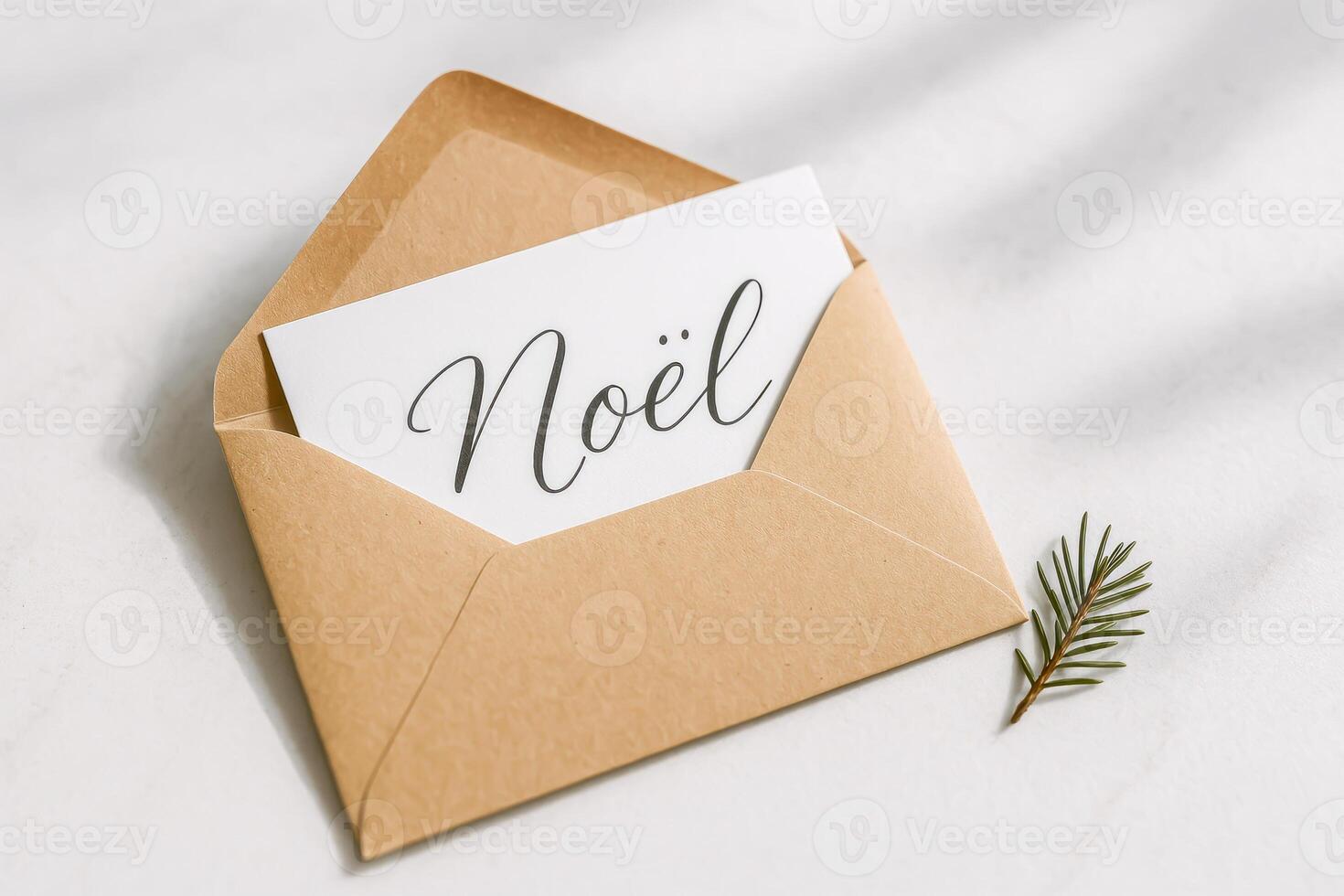 Minimal Christmas Greeting Card In Kraft Envelope With Elegant Typography photo