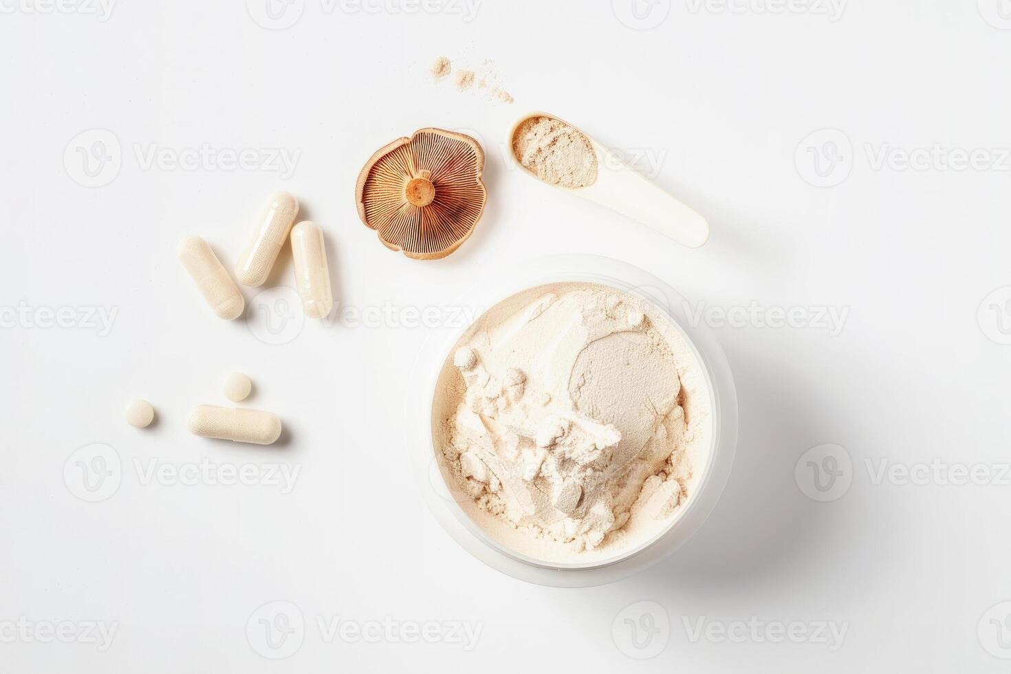 Reishi mushroom powder, capsules, and bowl of supplement on clean white background photo