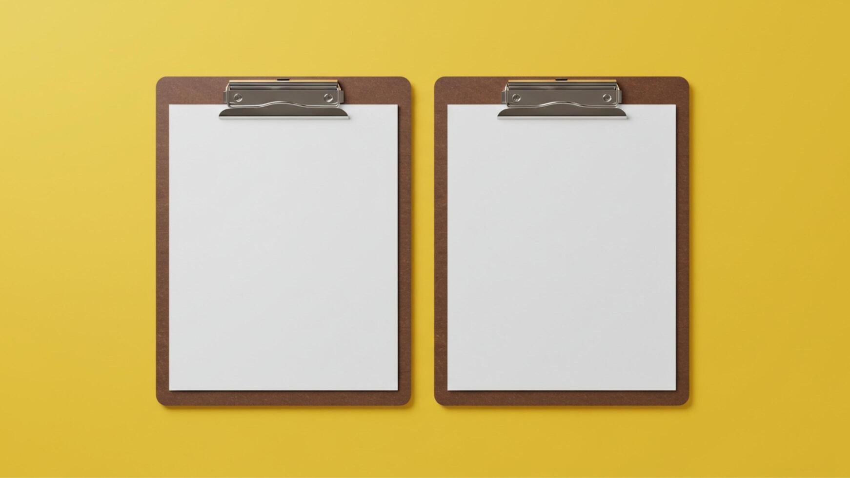 Two Clipboard with blank white paper for copy space, on clean yellow background photo