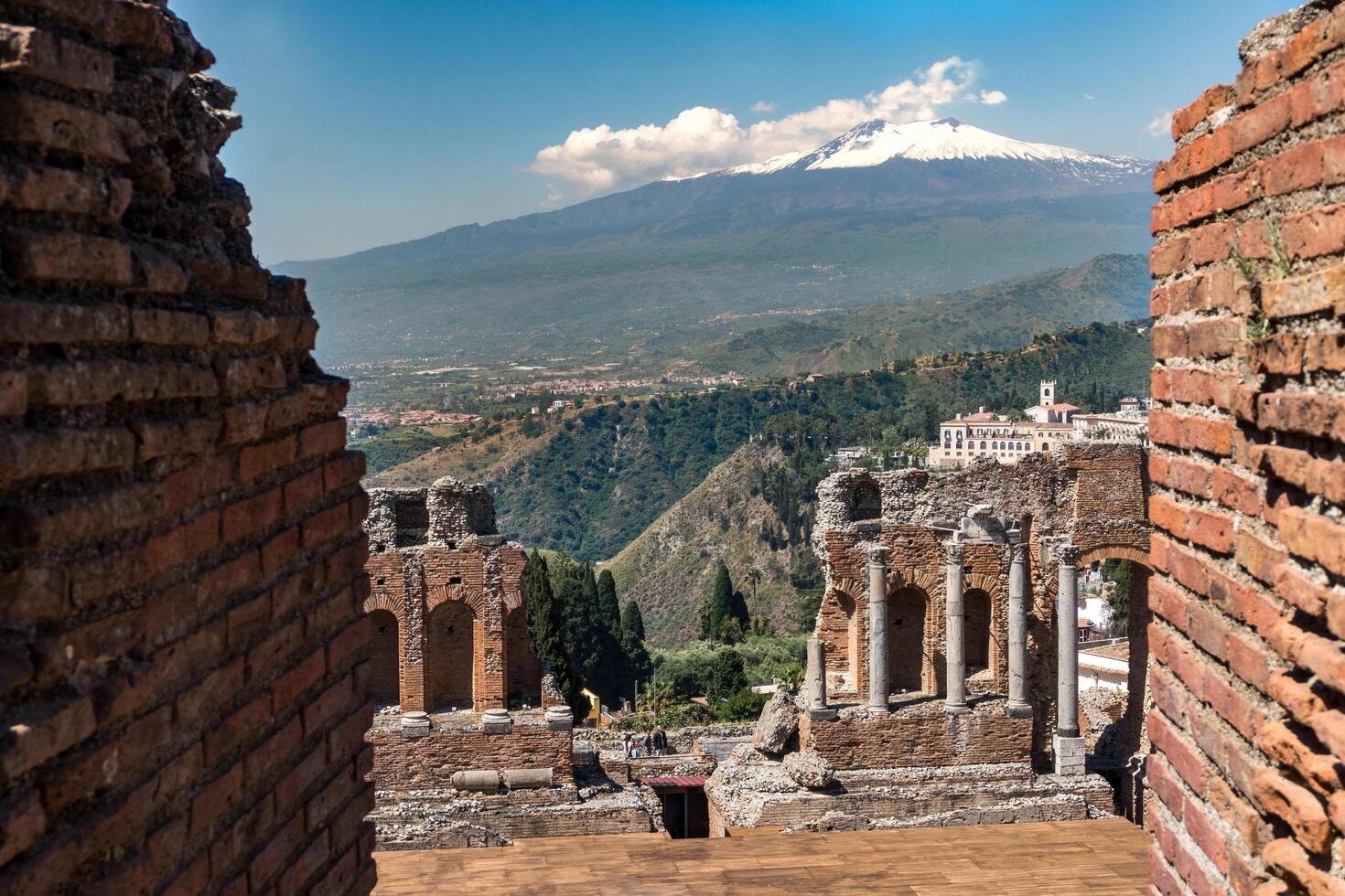 Sicily, Italy-May 12, 2022-View of the ruins of the ancient theatre of Taormina during a sunny day photo