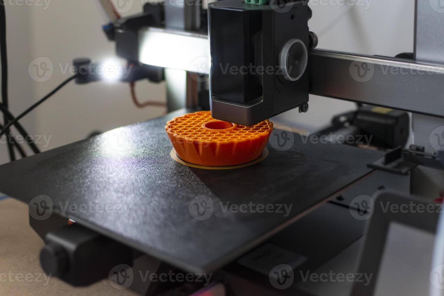 3d printer printing an object on the tray with pla filament, corn starch, non-waterproof filament, tech photo