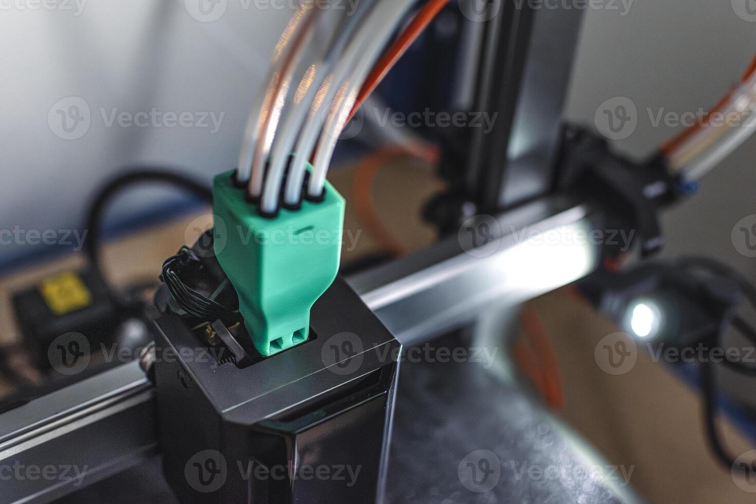 3d printer printing an object on the tray with pla filament, corn starch, non-waterproof filament, spool photo