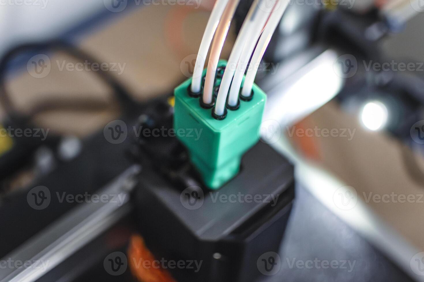 3d printer printing an object on the tray with pla filament, corn starch, non-waterproof filament, non waterproof photo