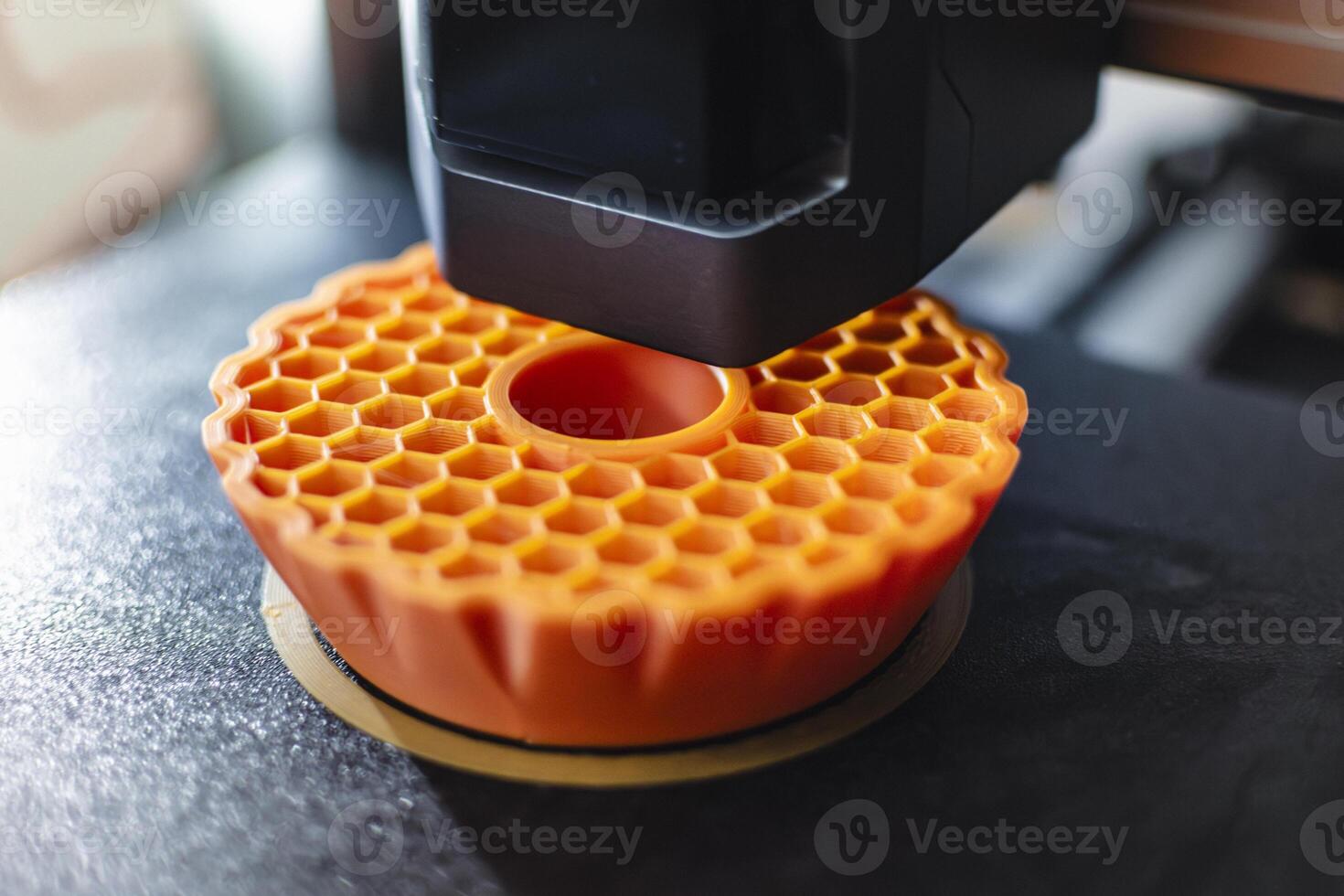 3d printer printing an object on the tray with pla filament, corn starch, non-waterproof filament, plastic photo