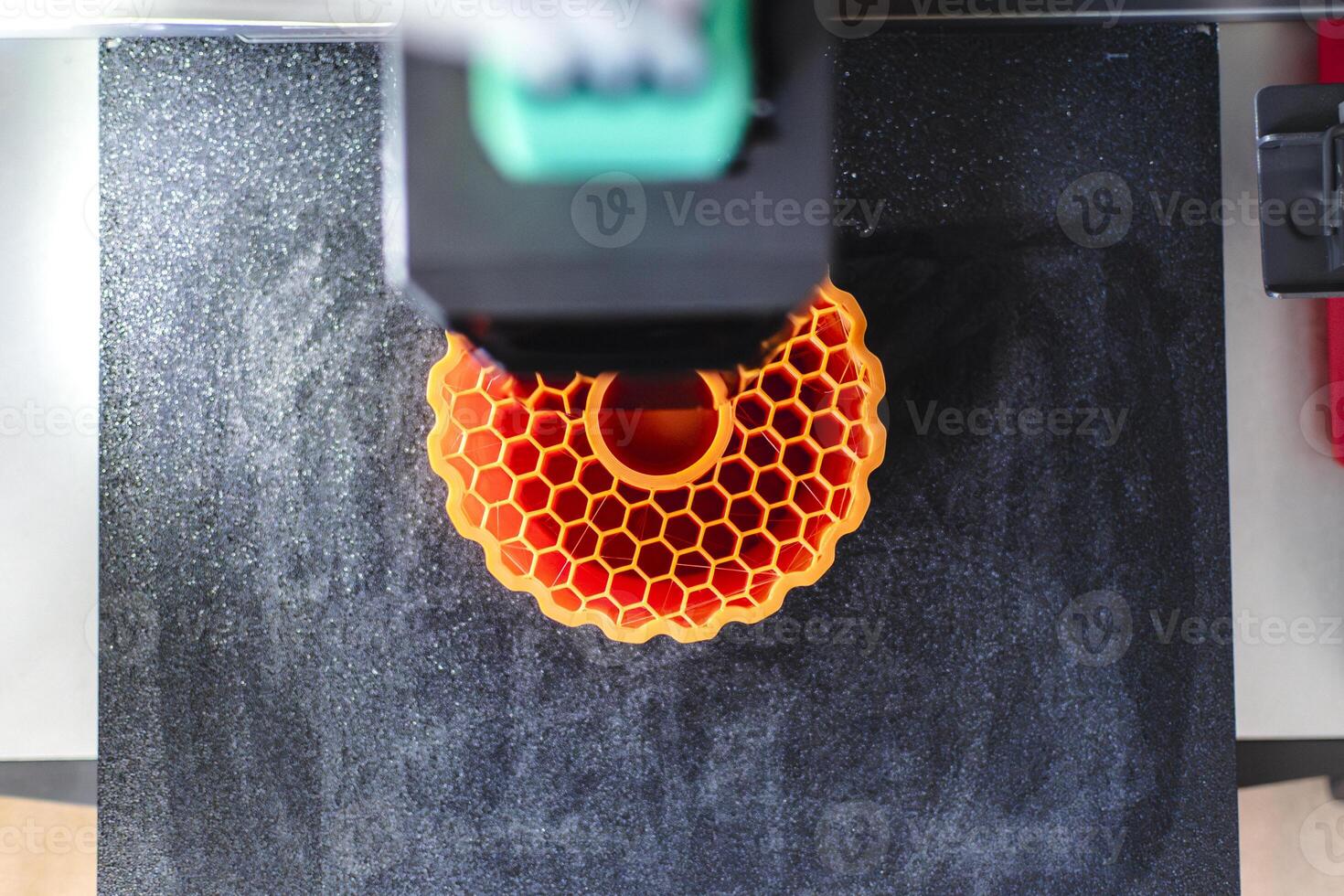 3d printer printing an object on the tray with pla filament, corn starch, non-waterproof filament, business photo